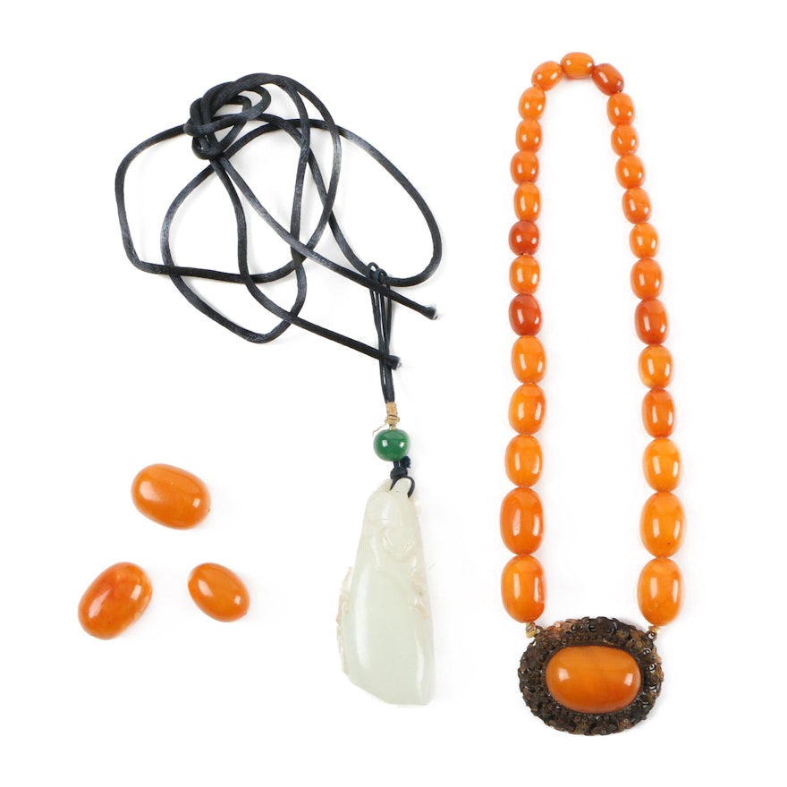 Assortment of Costume Jewelry Featuring Amber