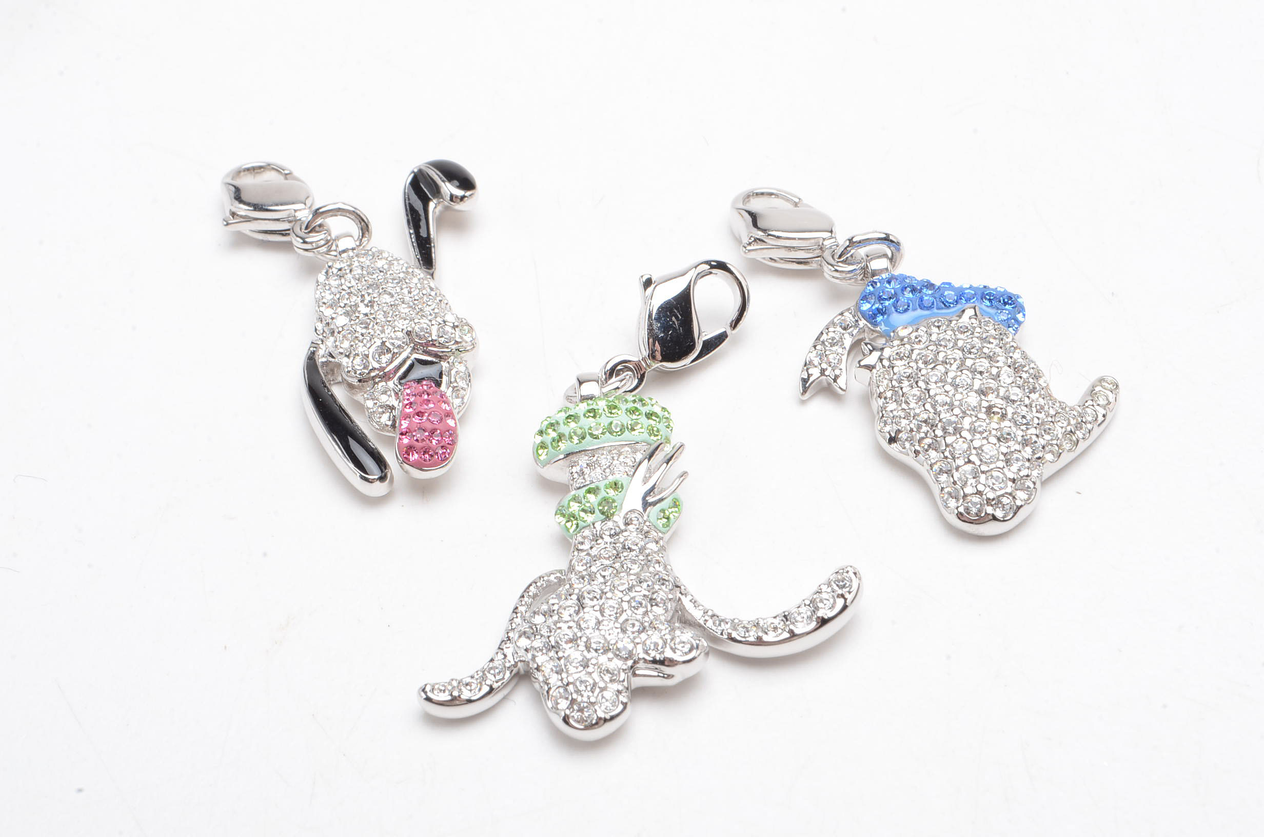 Group of Silver Tone Swarovski Disney Charms