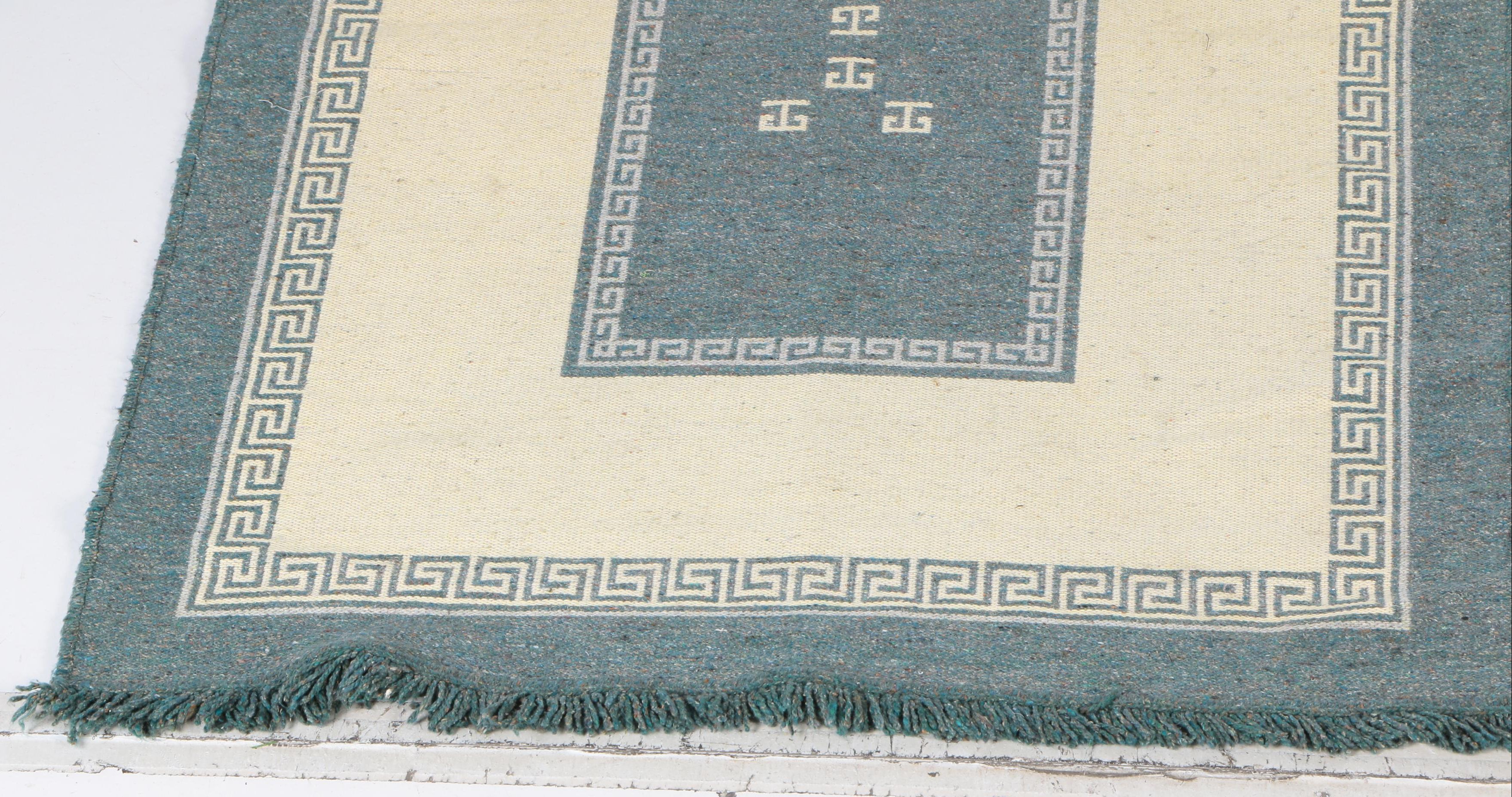 Handwoven Gray and White Meander Motif Area Rug