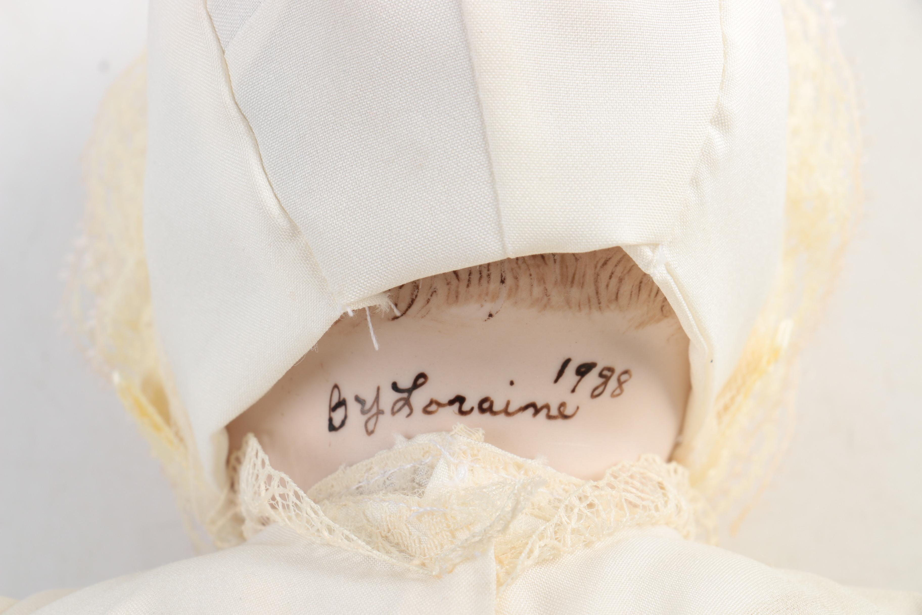 Vintage Hand-Painted Bisque Doll by Loraine