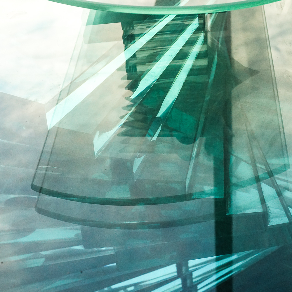 Glass Coffee Table with Spiral Stacked Base