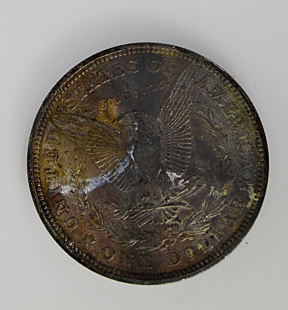 1922 Silver Peace Dollar and Three 1921 Morgan Silver Dollars