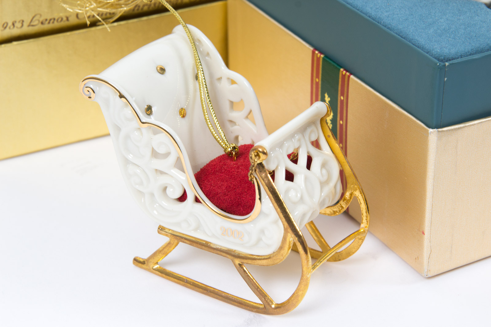 Eight Early 2000s Lenox Christmas Ornaments