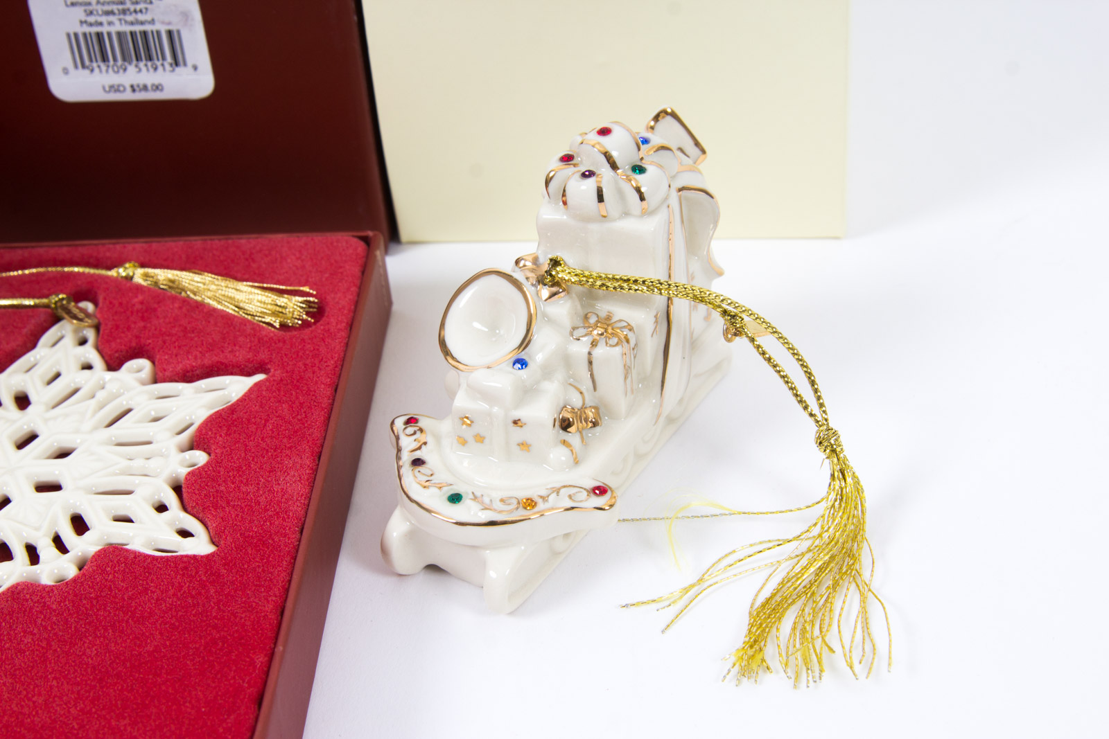 Eight Early 2000s Lenox Christmas Ornaments