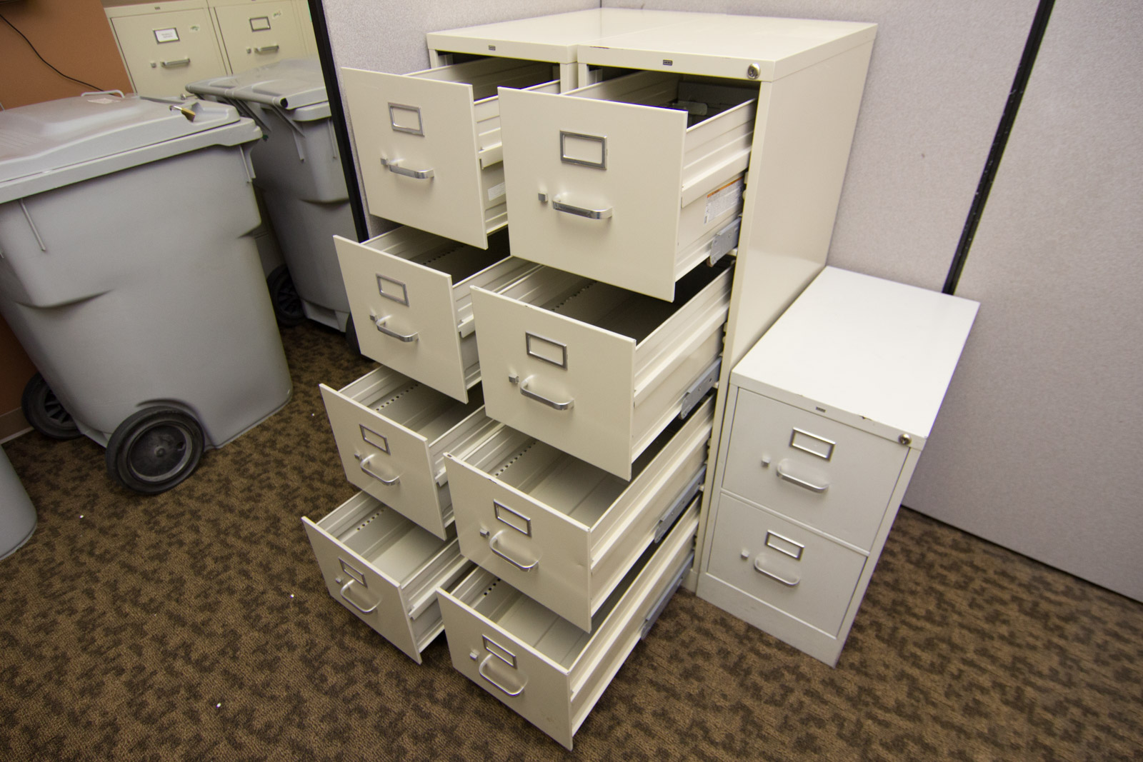 Three Varying HON Filing Cabinets
