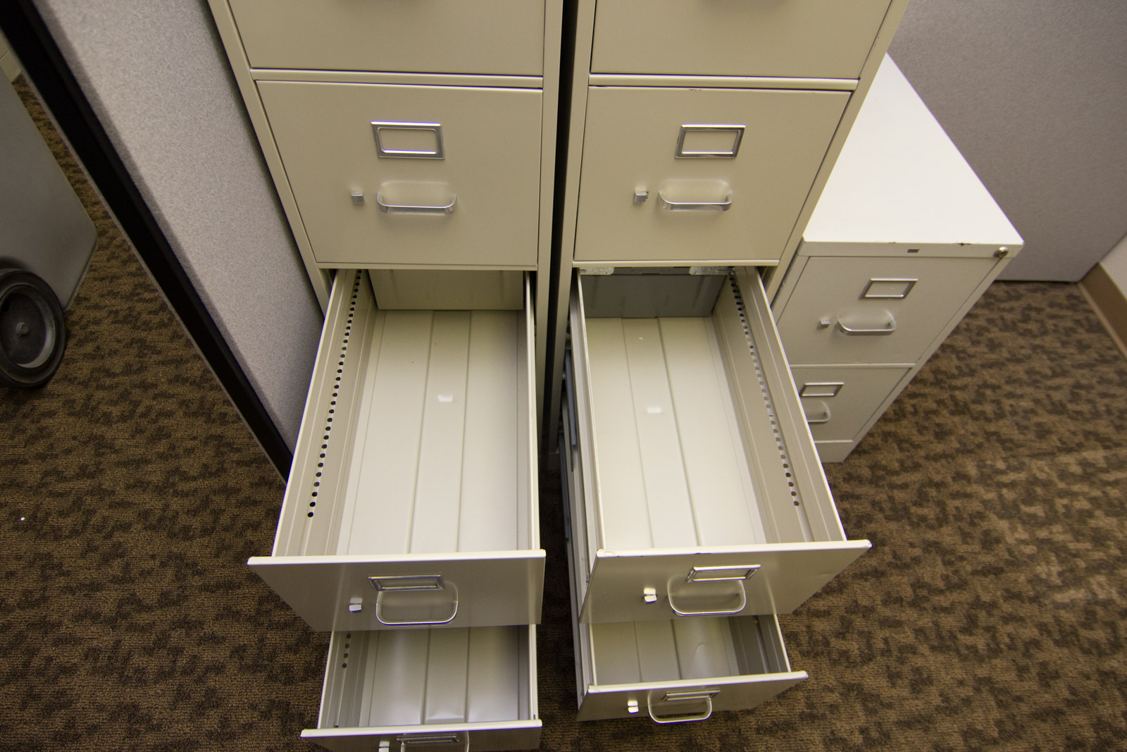 Three Varying HON Filing Cabinets