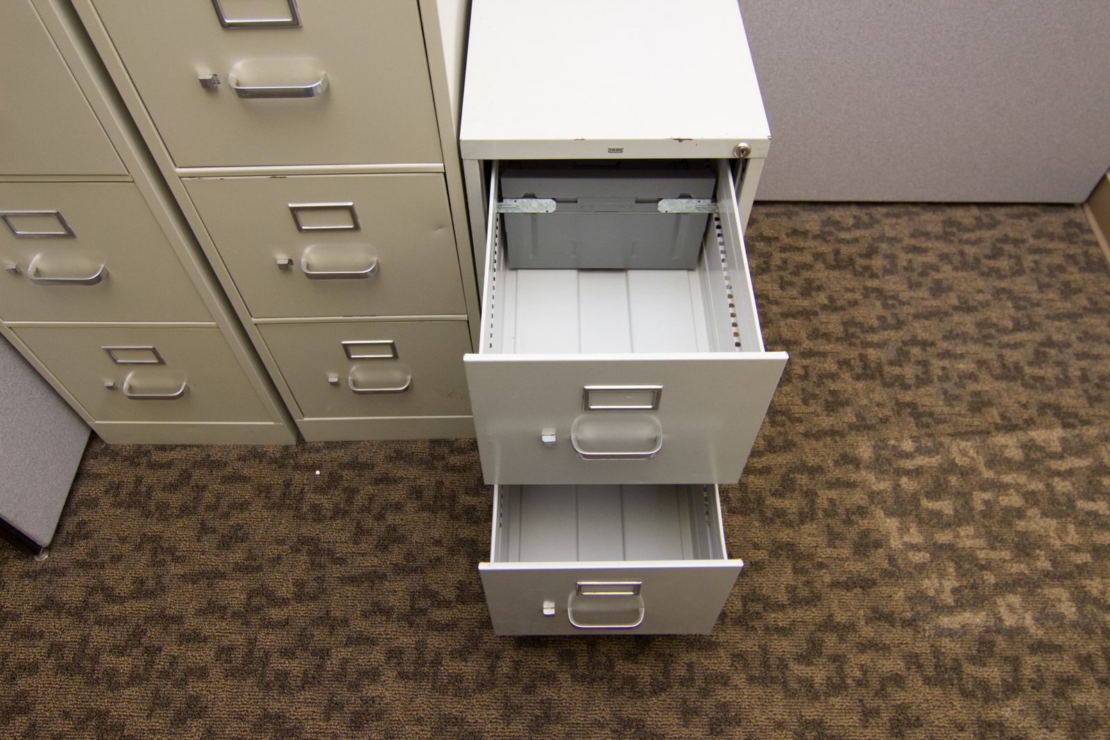 Three Varying HON Filing Cabinets