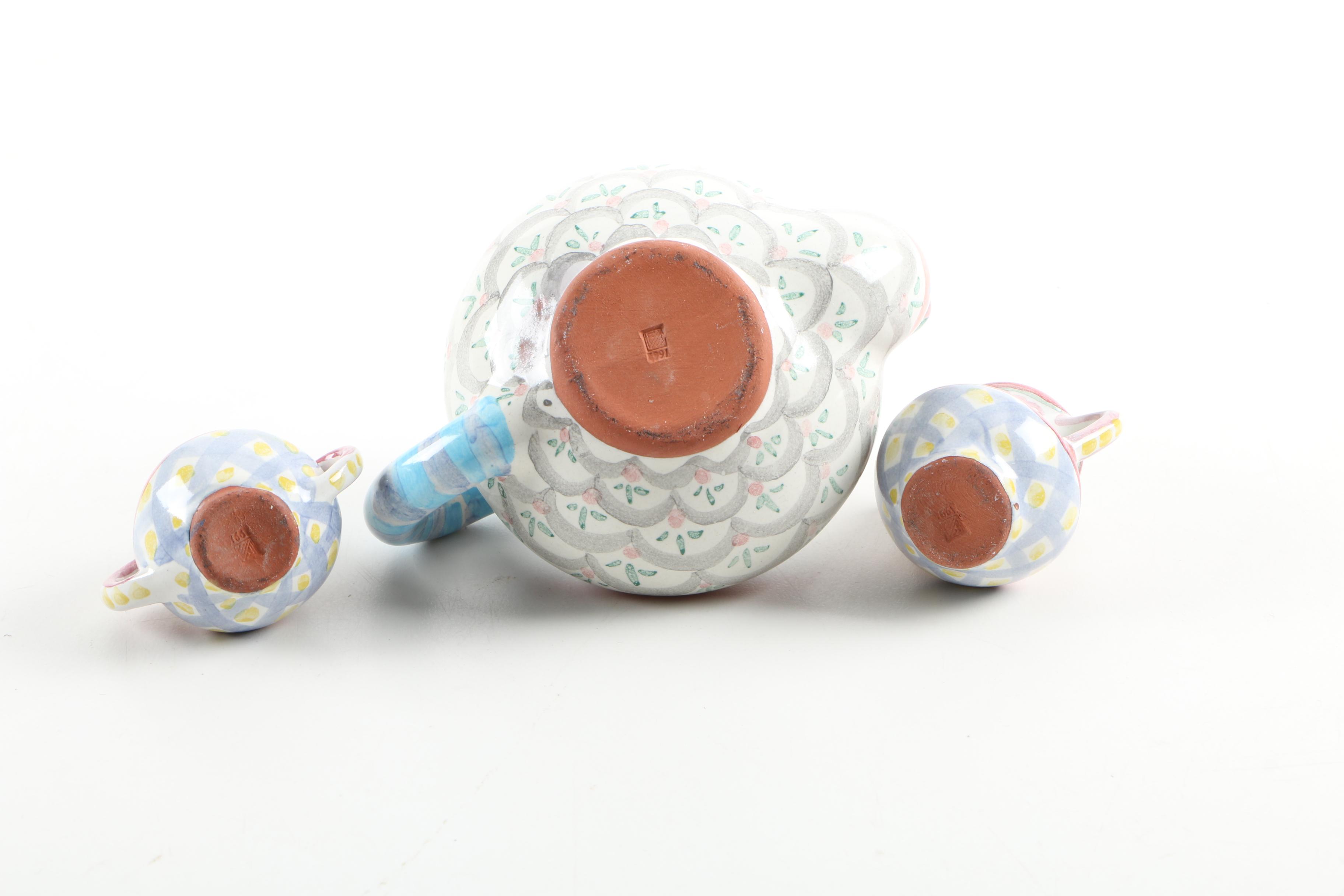 MacKenzie-Childs Ceramic Pitcher, Tea Set, and Portuguese Candle Holders
