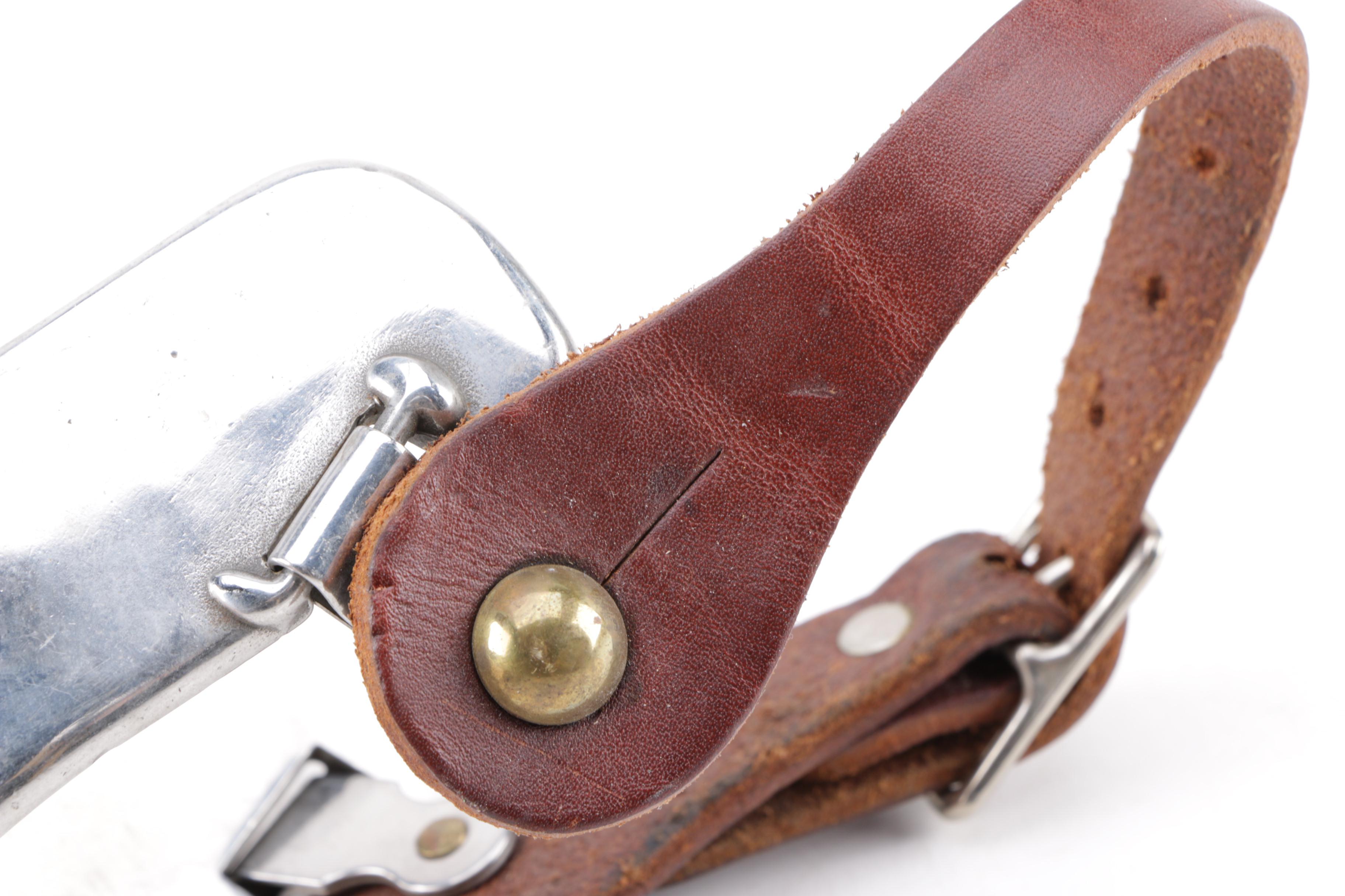 Pair of Spurs with Leather Straps