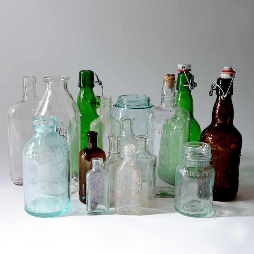 Variety of Vintage and Antique Glass Bottles