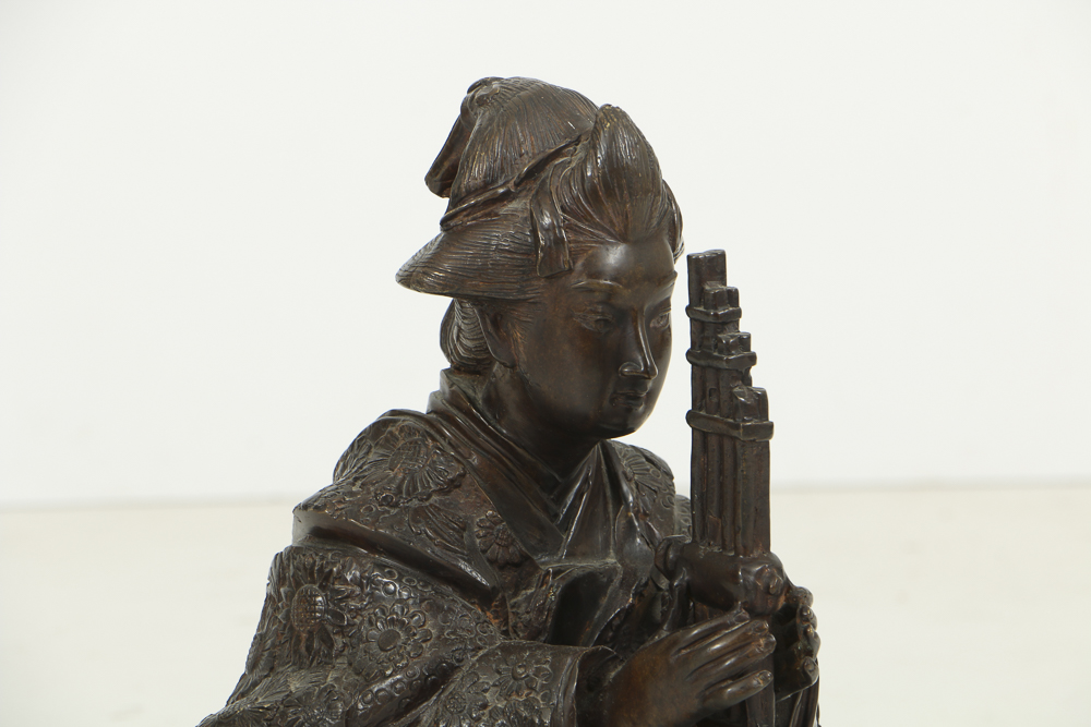 Japanese Bronze Kneeling Geisha Playing Reeded Instrument