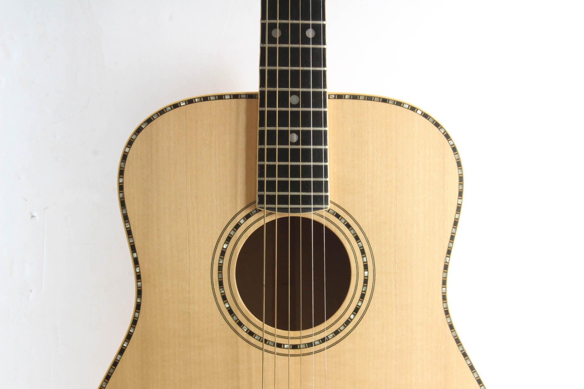 Acoustic Guitar with Mother of Pearl Inlay