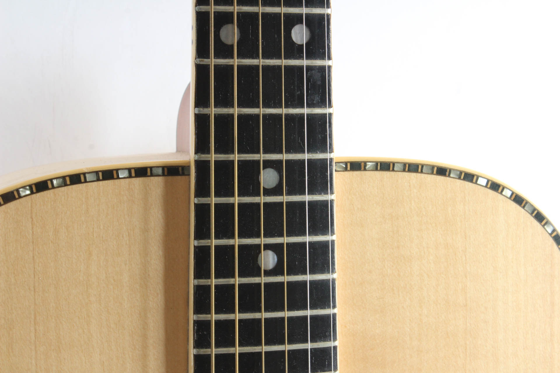 Acoustic Guitar with Mother of Pearl Inlay