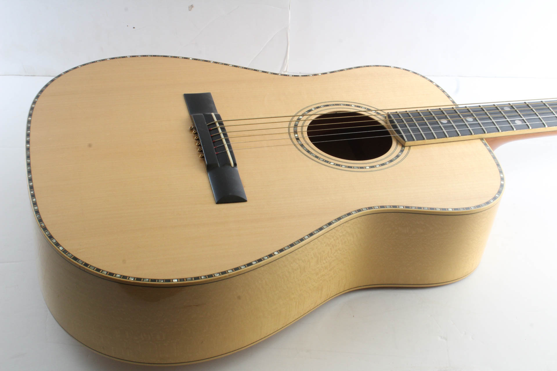 Acoustic Guitar with Mother of Pearl Inlay