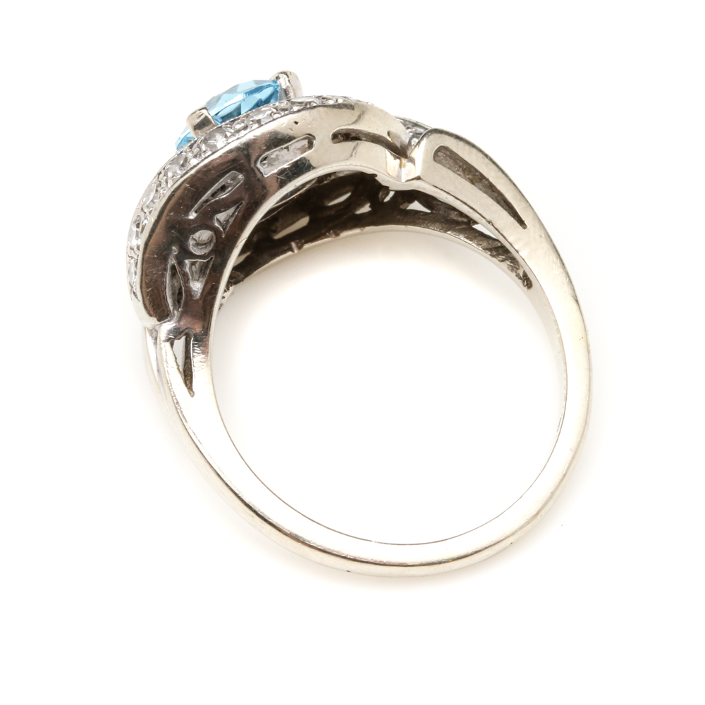 14K White Gold Blue Topaz and 1.00 CTW Diamond Bypass Ring