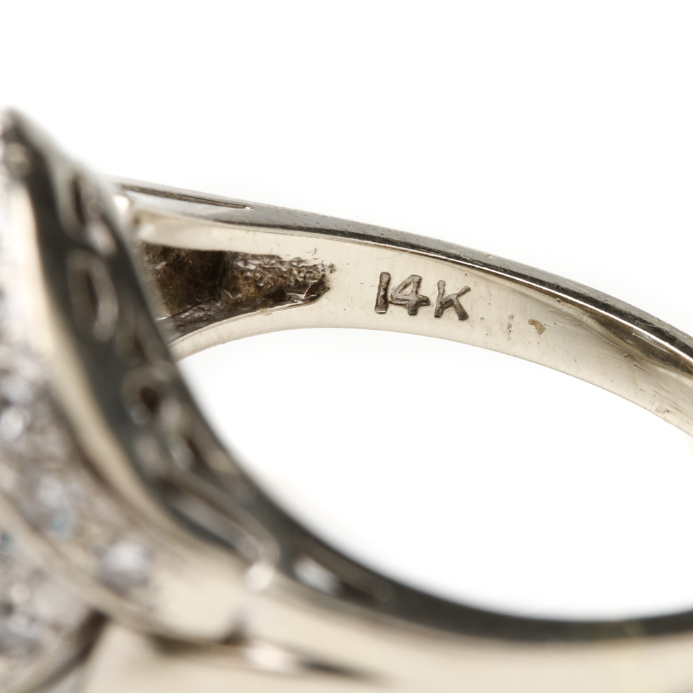 14K White Gold Blue Topaz and 1.00 CTW Diamond Bypass Ring