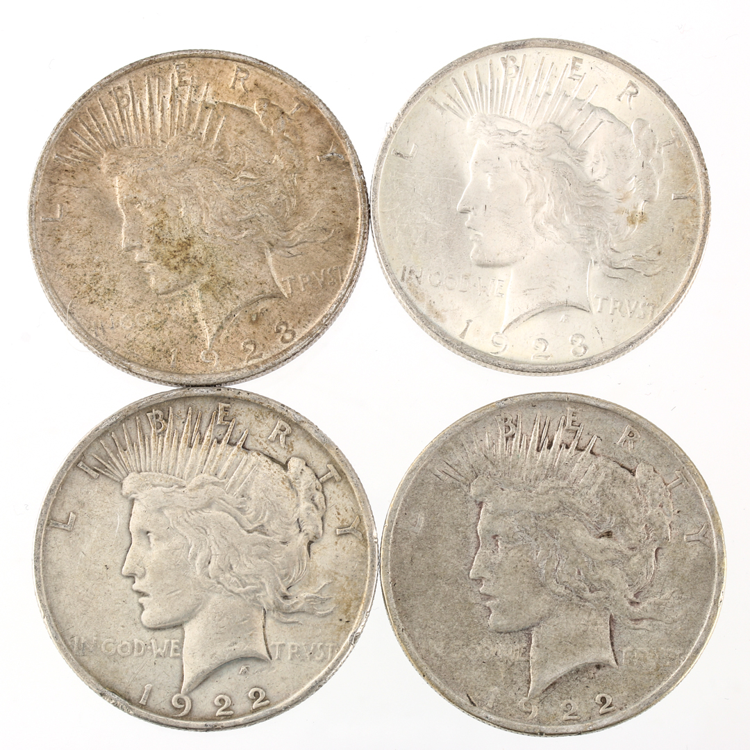Four Peace Silver Dollars