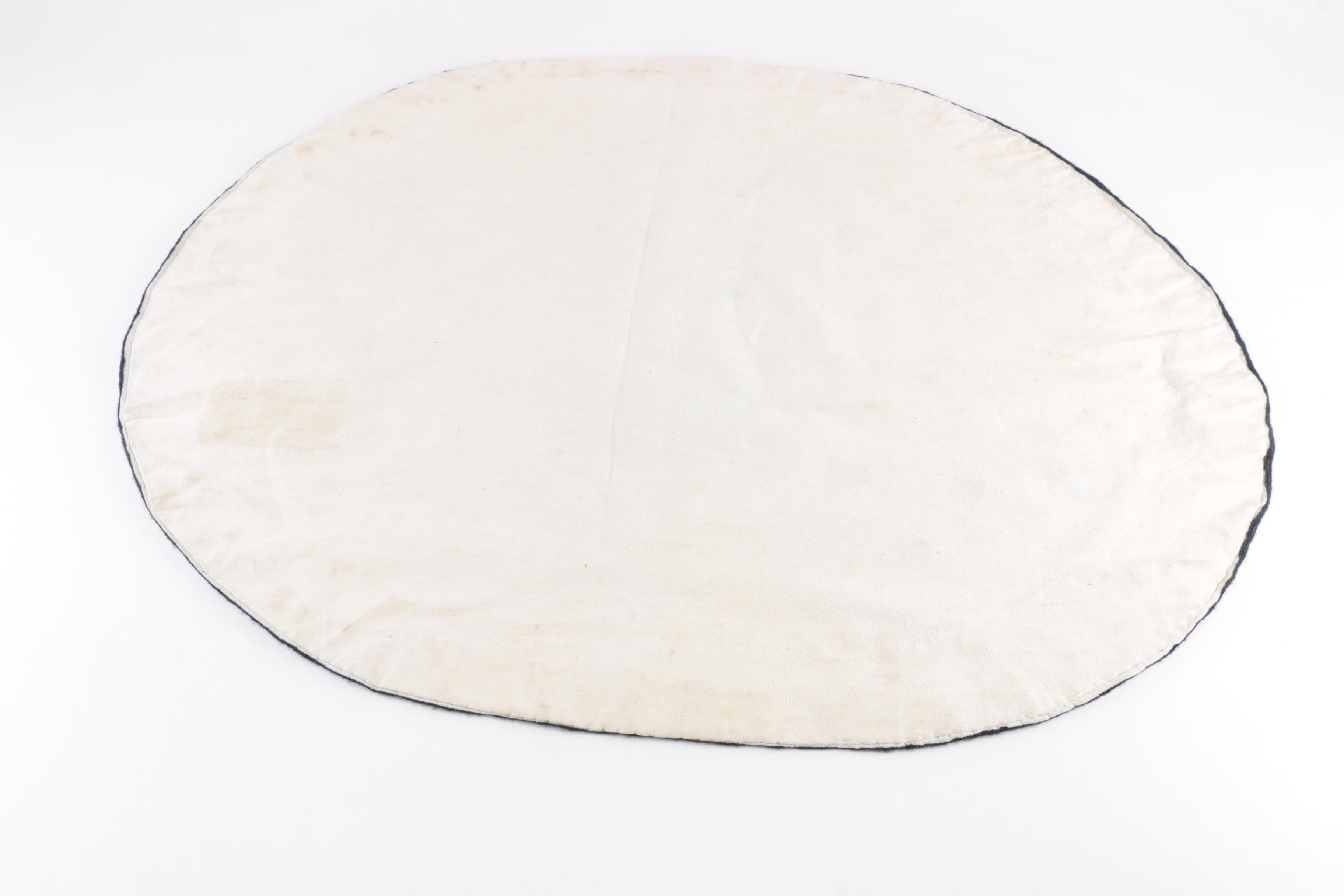 Hand-Stitched Floral Oval Accent Rug