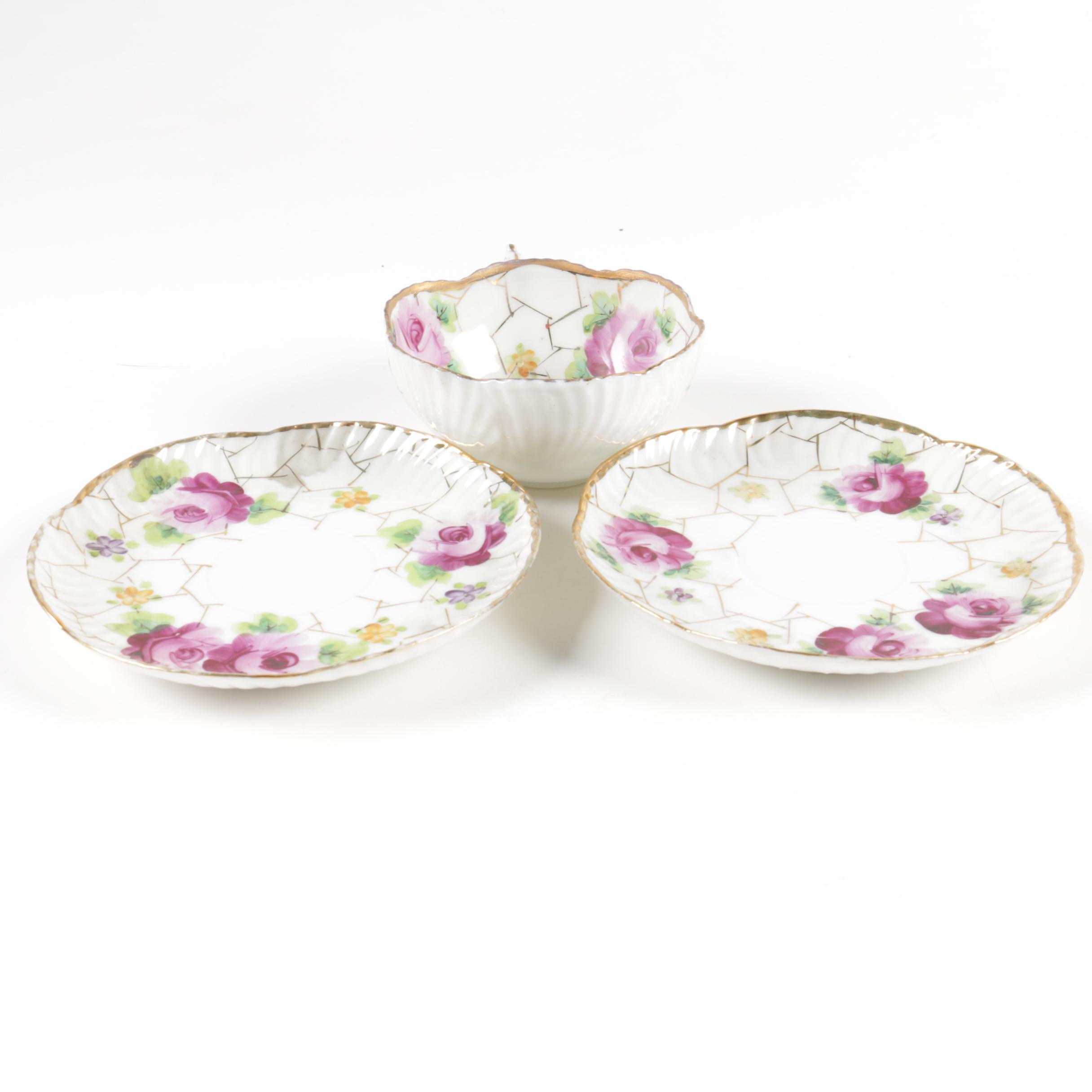 Hand Painted Teacup with Two Saucers