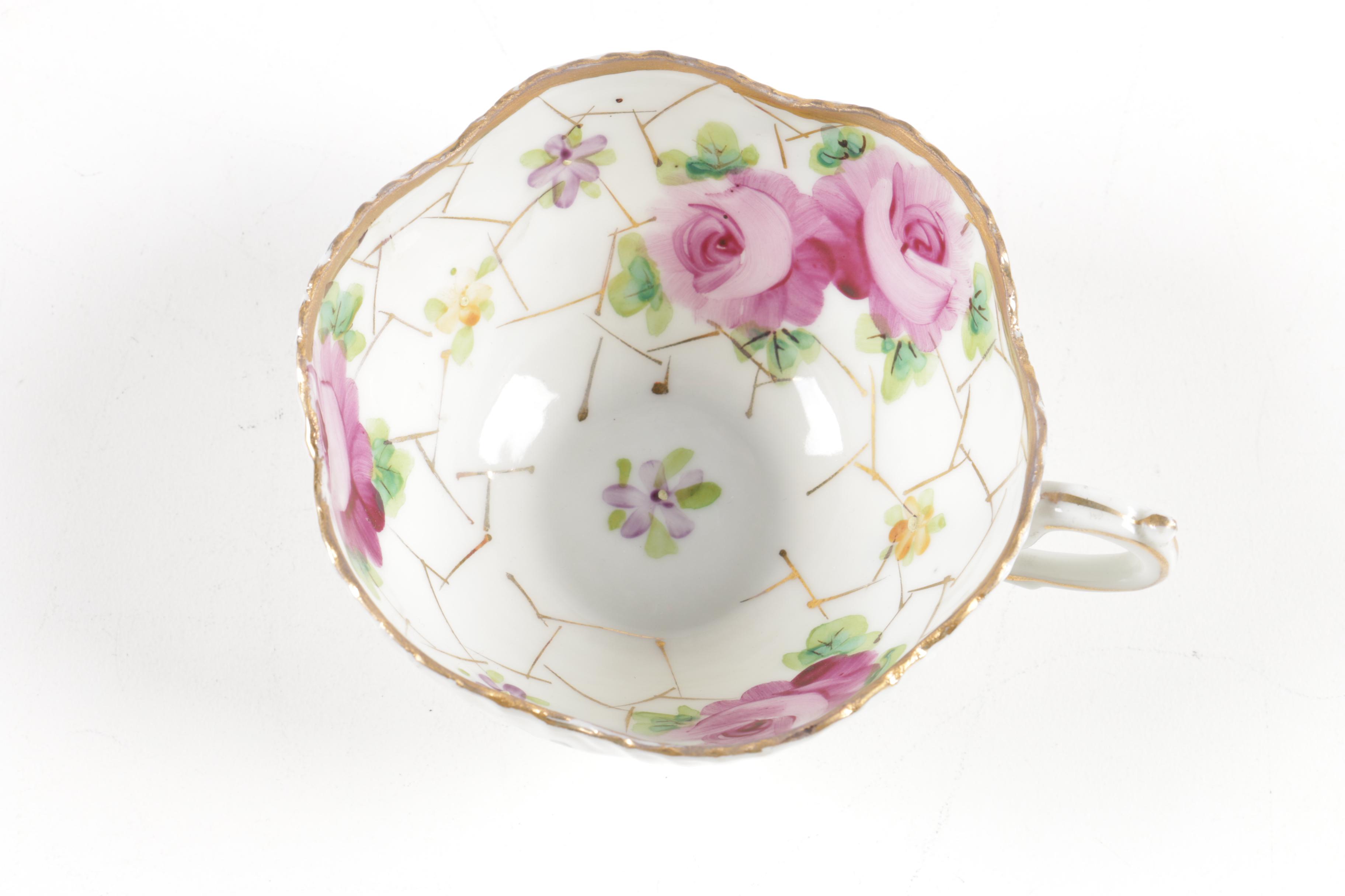 Hand Painted Teacup with Two Saucers