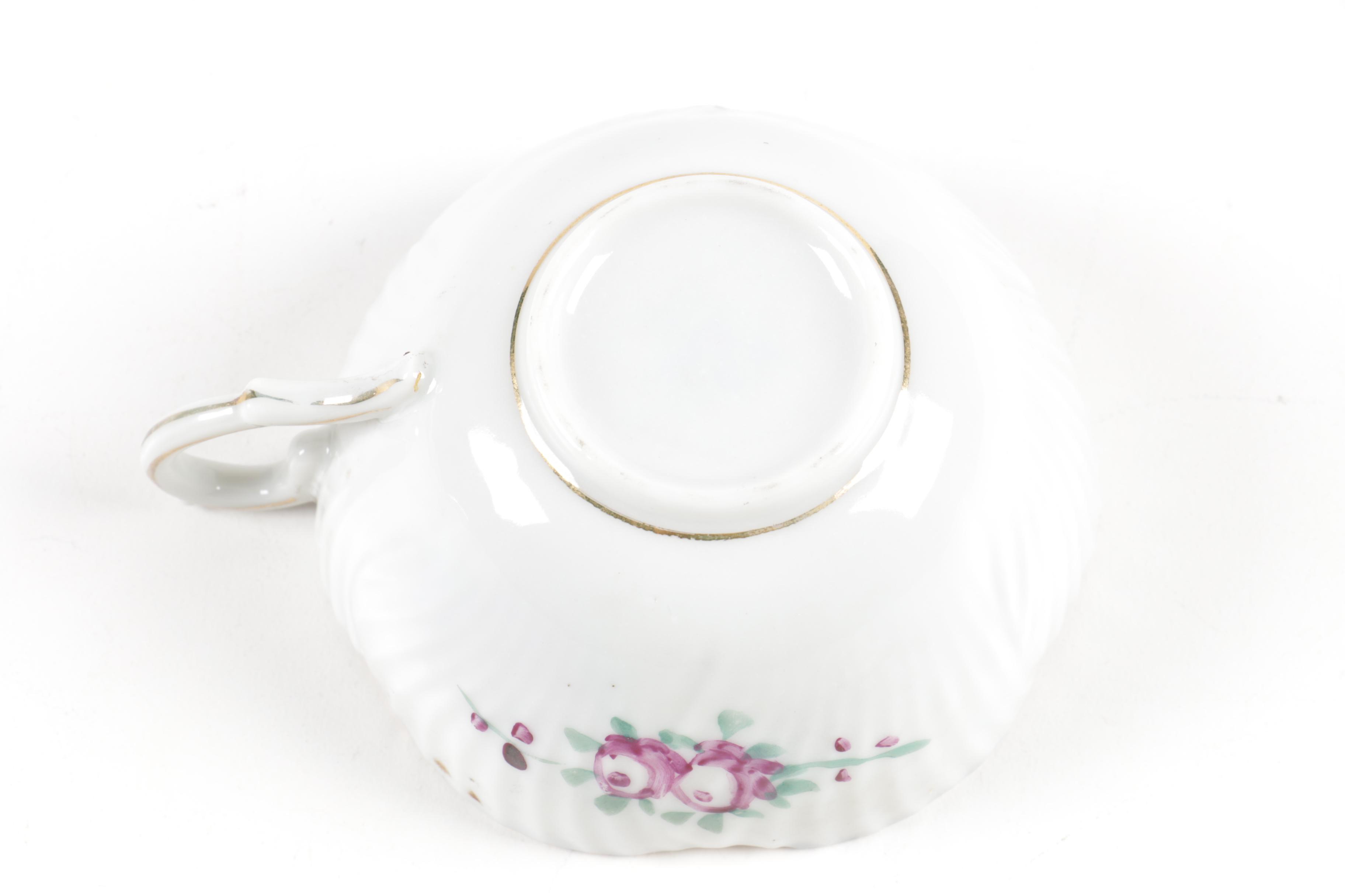 Hand Painted Teacup with Two Saucers