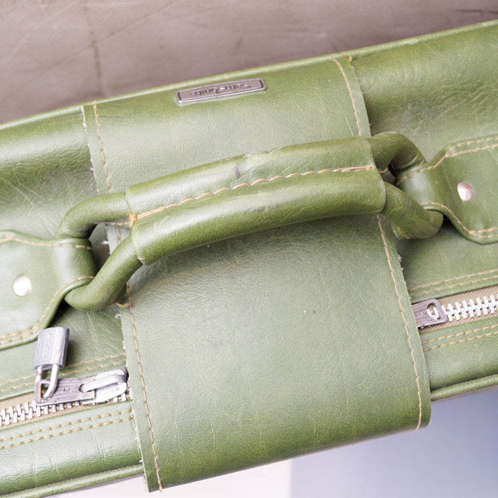 White Oshkosh Suitcase and Other Vintage Luggage