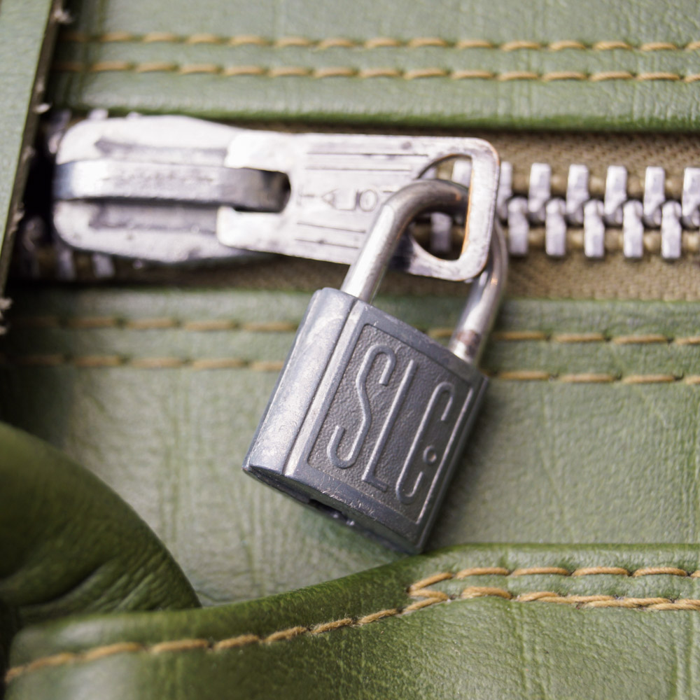 White Oshkosh Suitcase and Other Vintage Luggage