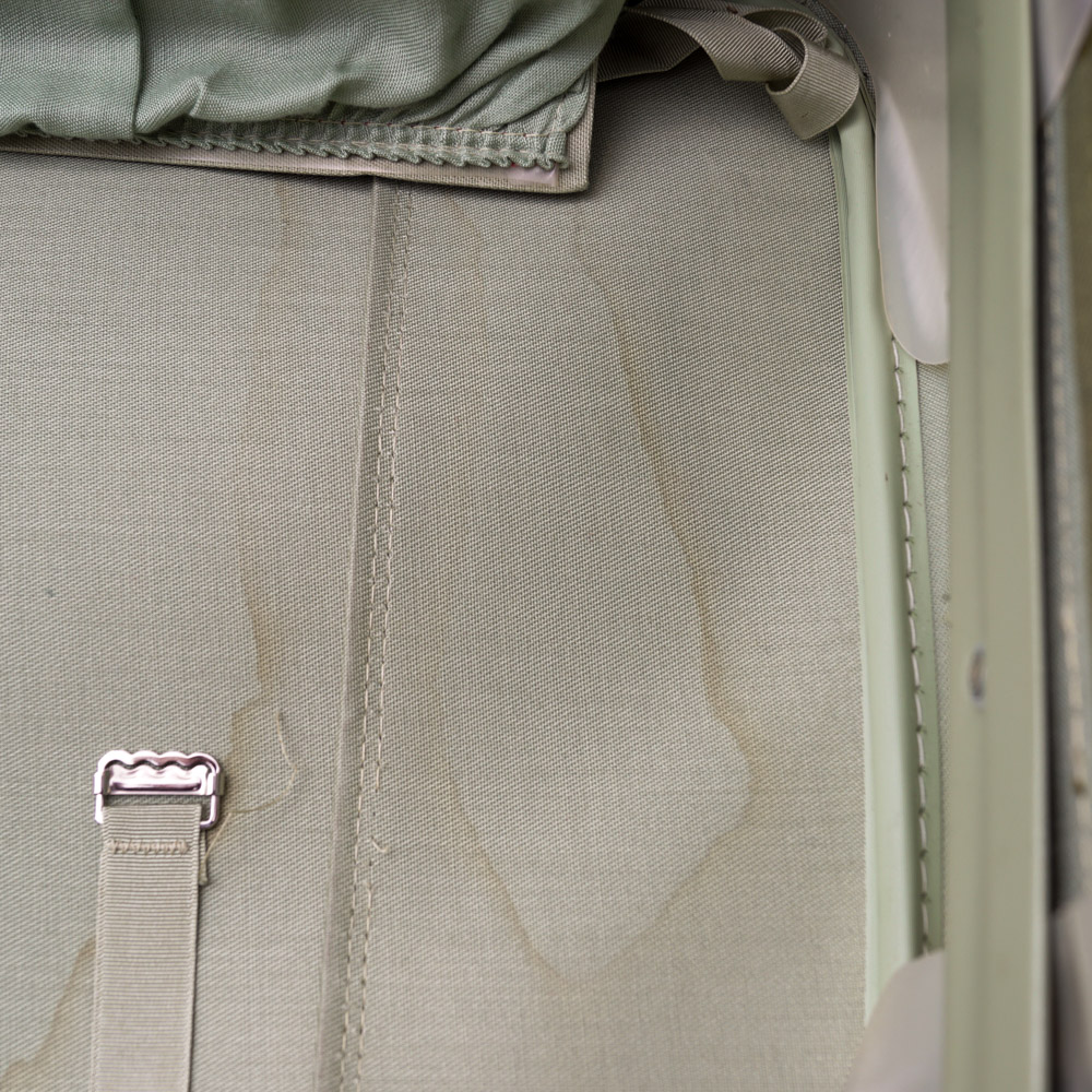 White Oshkosh Suitcase and Other Vintage Luggage