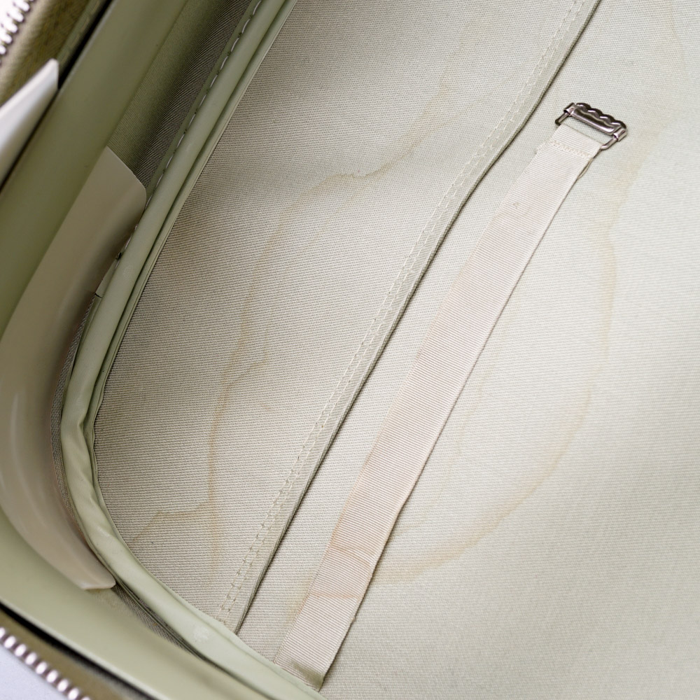 White Oshkosh Suitcase and Other Vintage Luggage