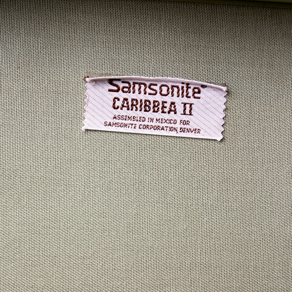 White Oshkosh Suitcase and Other Vintage Luggage