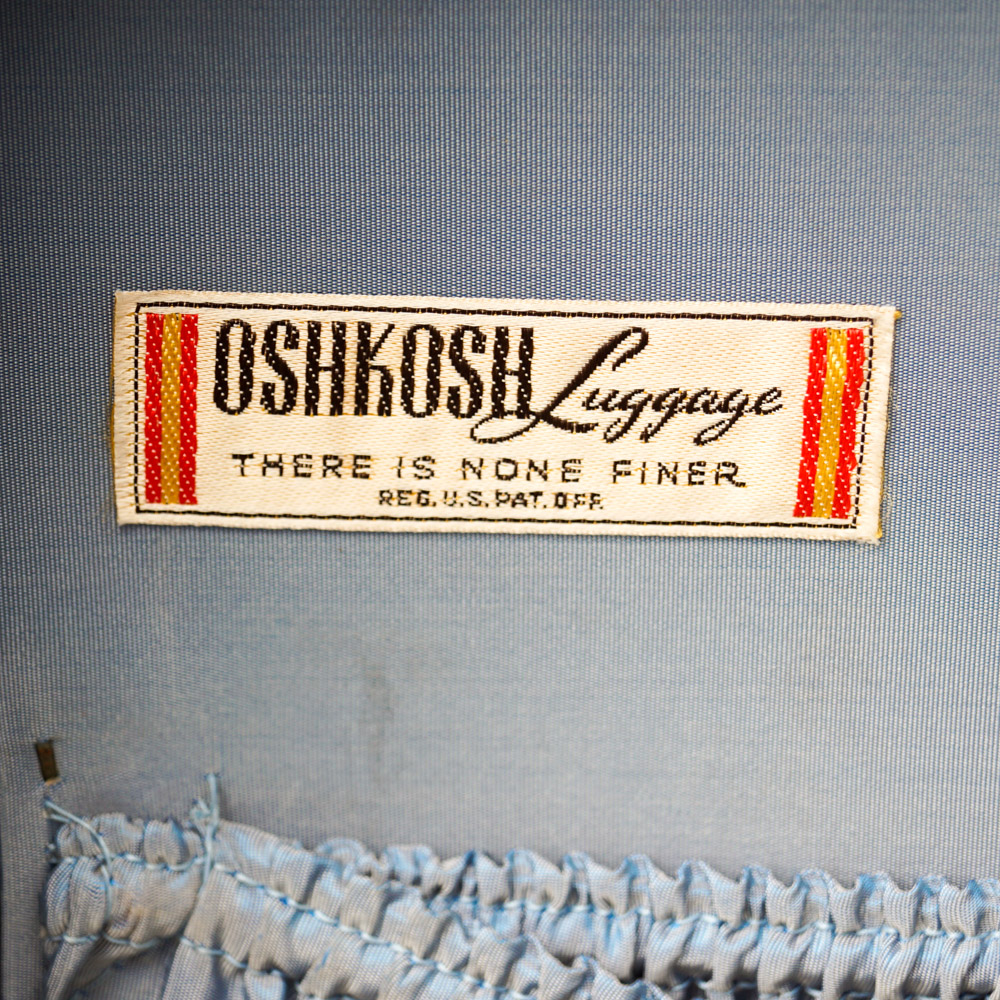 White Oshkosh Suitcase and Other Vintage Luggage