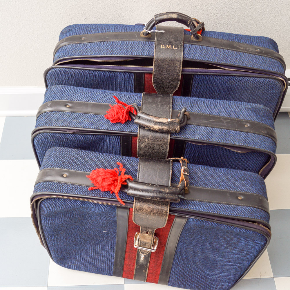 White Oshkosh Suitcase and Other Vintage Luggage