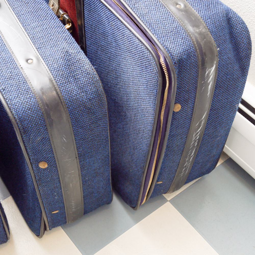 White Oshkosh Suitcase and Other Vintage Luggage