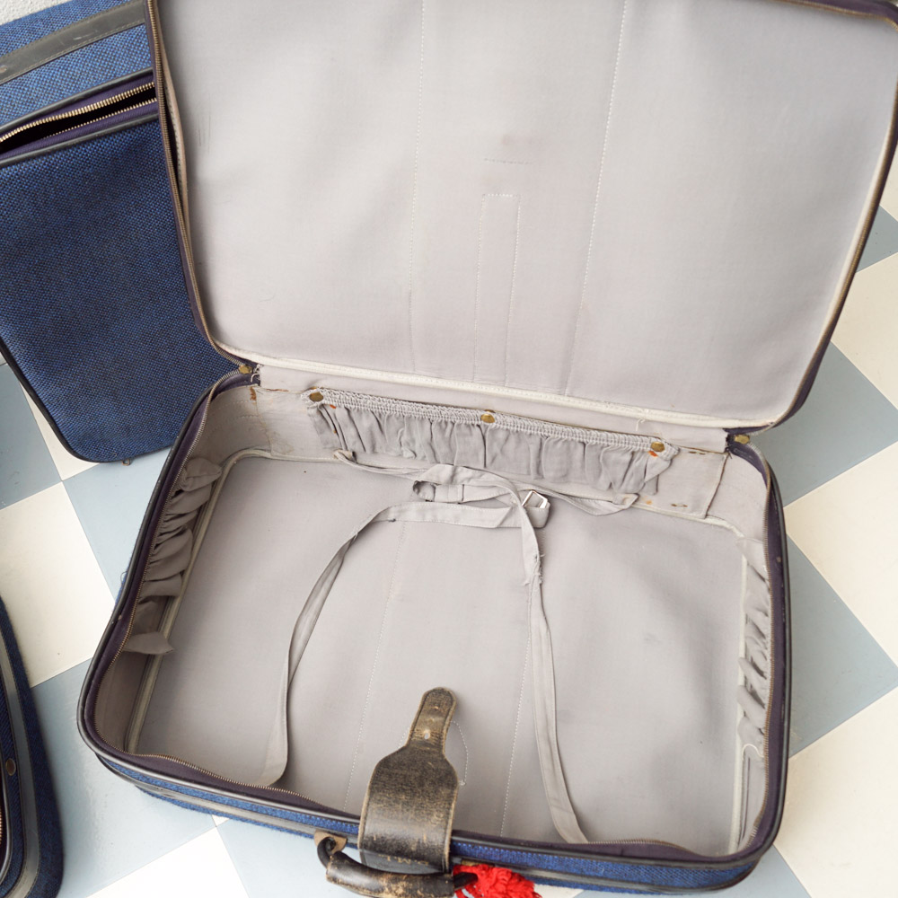 White Oshkosh Suitcase and Other Vintage Luggage