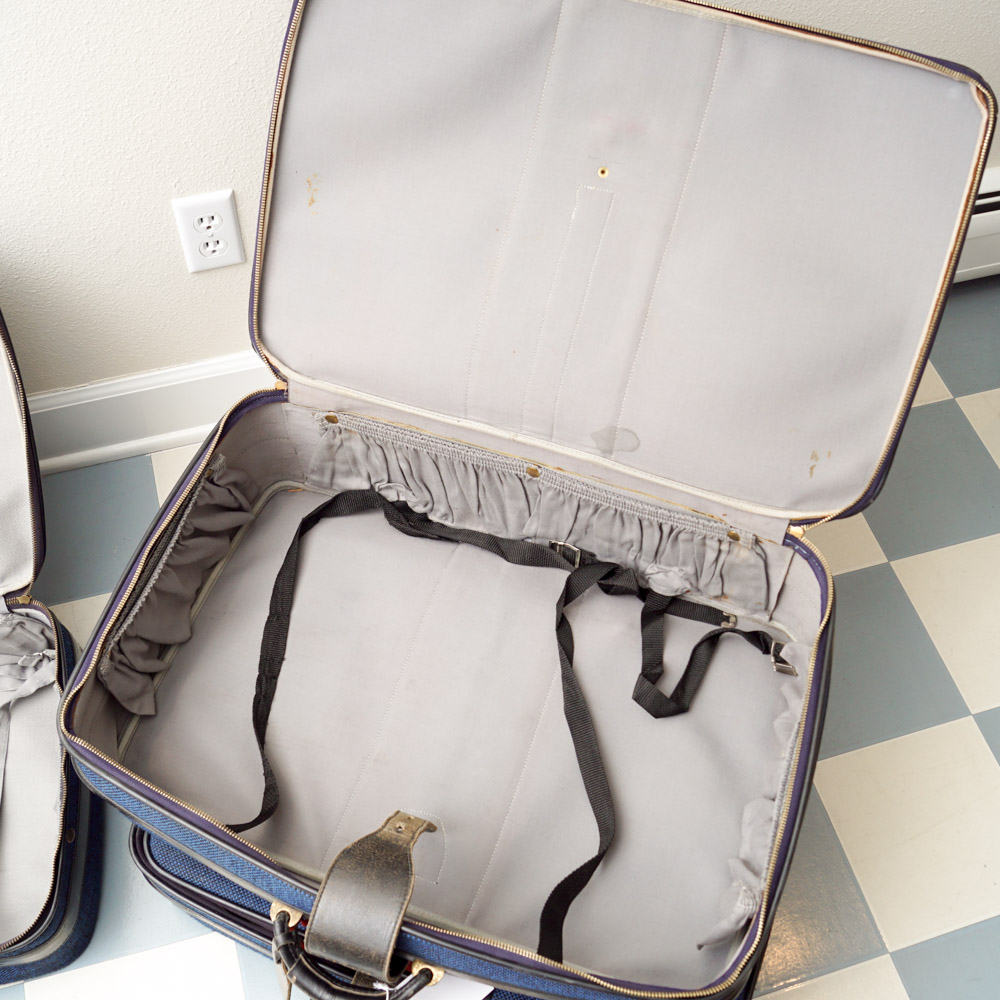 White Oshkosh Suitcase and Other Vintage Luggage
