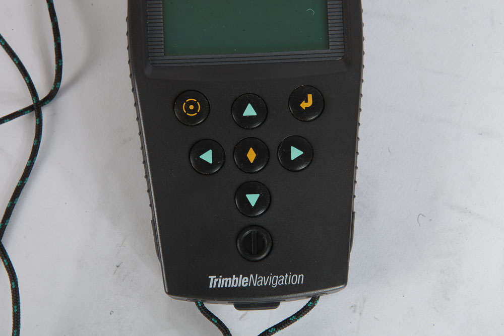 Trimble Navigation Scout GPS and Vintage Flashlight