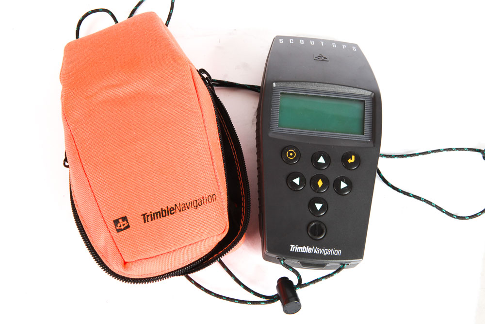 Trimble Navigation Scout GPS and Vintage Flashlight