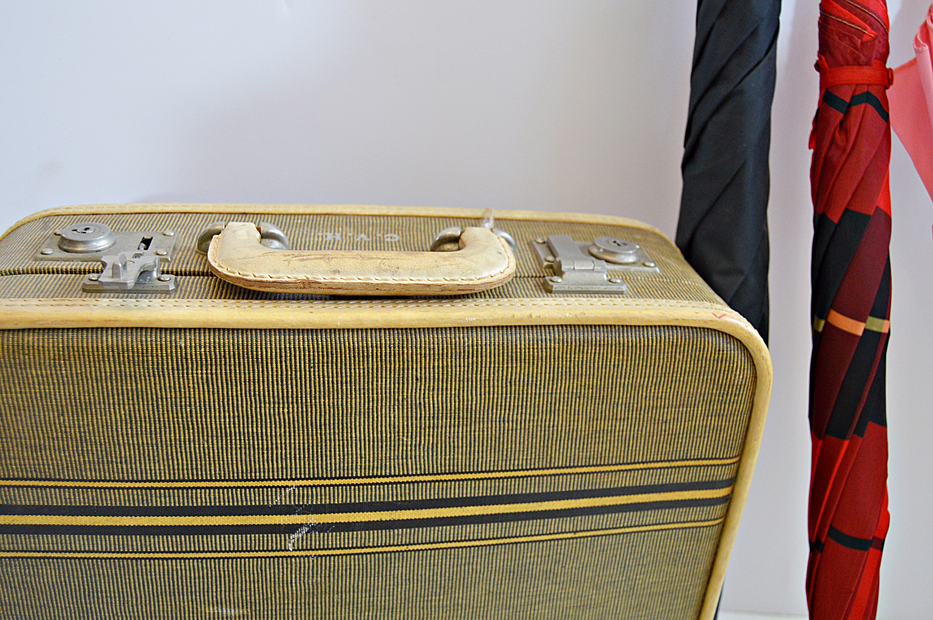 Vintage Umbrellas and Suitcase