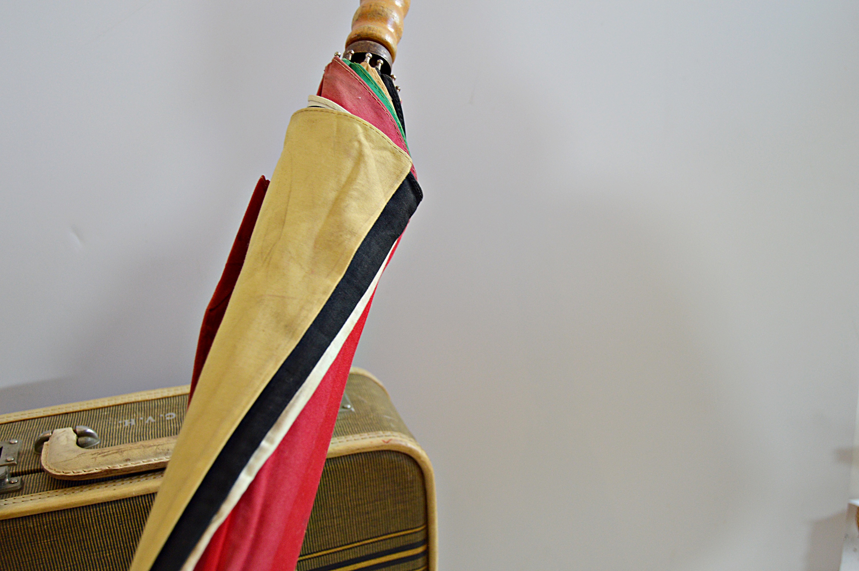 Vintage Umbrellas and Suitcase