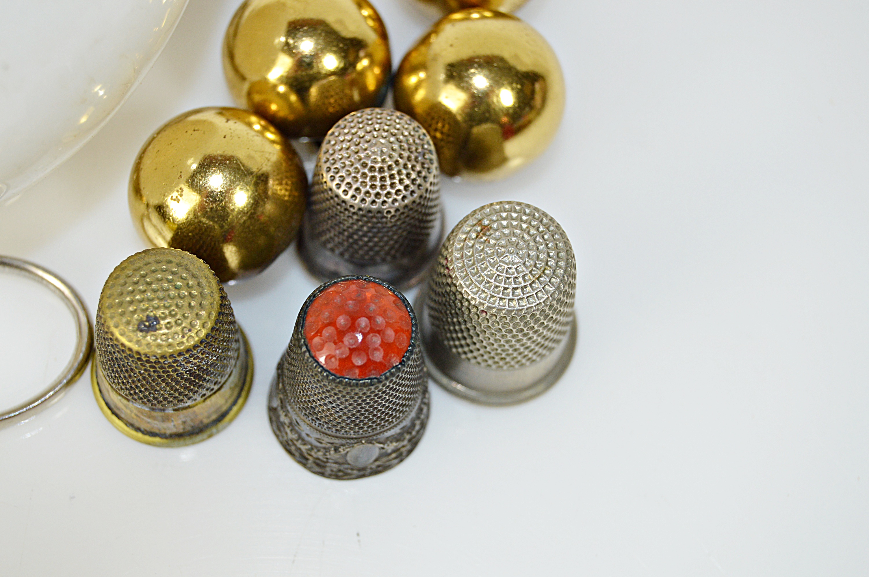 Vintage Sewing Collectibles with Glass Darning Egg, Sterling Thimbles, Scissors