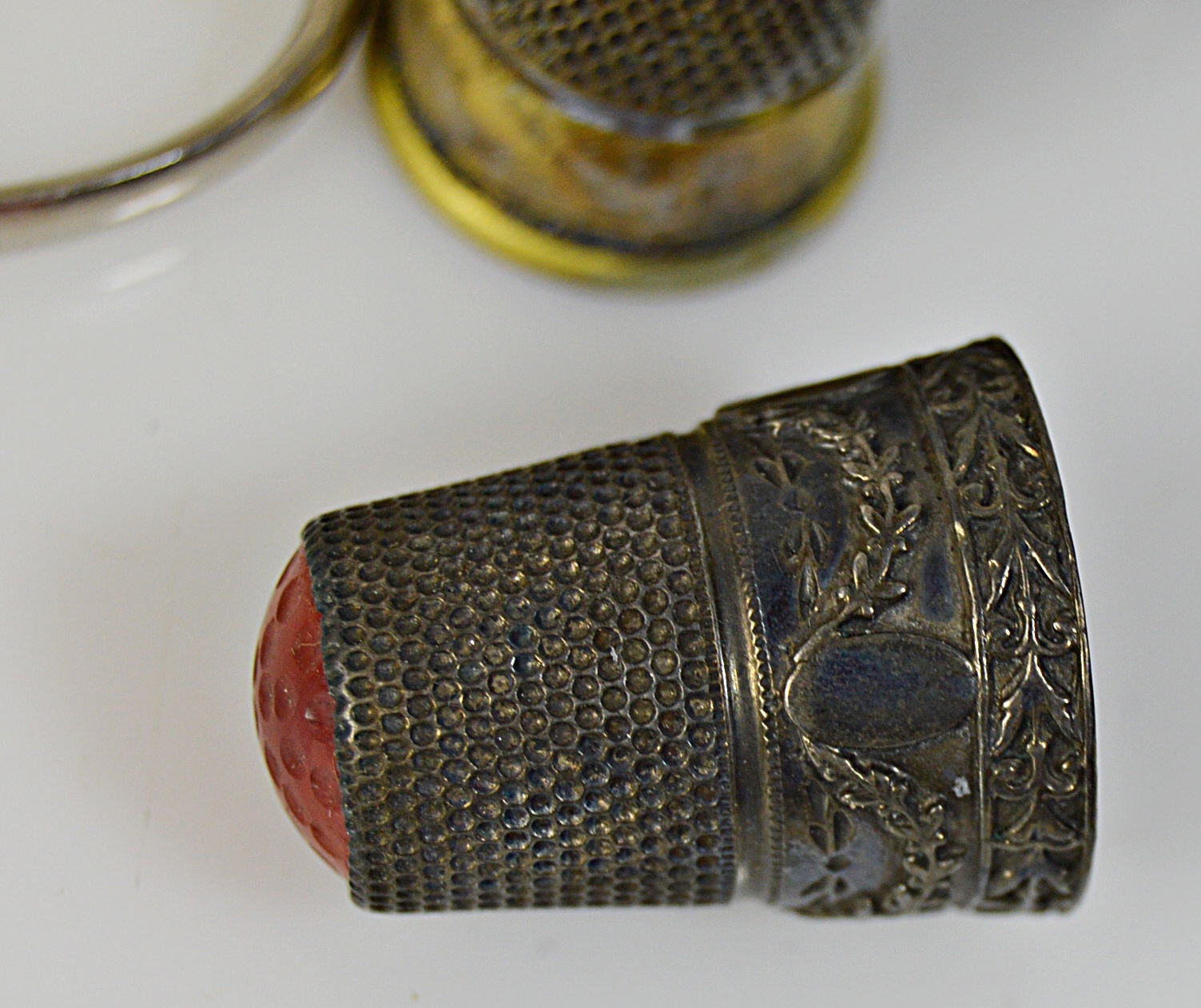 Vintage Sewing Collectibles with Glass Darning Egg, Sterling Thimbles, Scissors