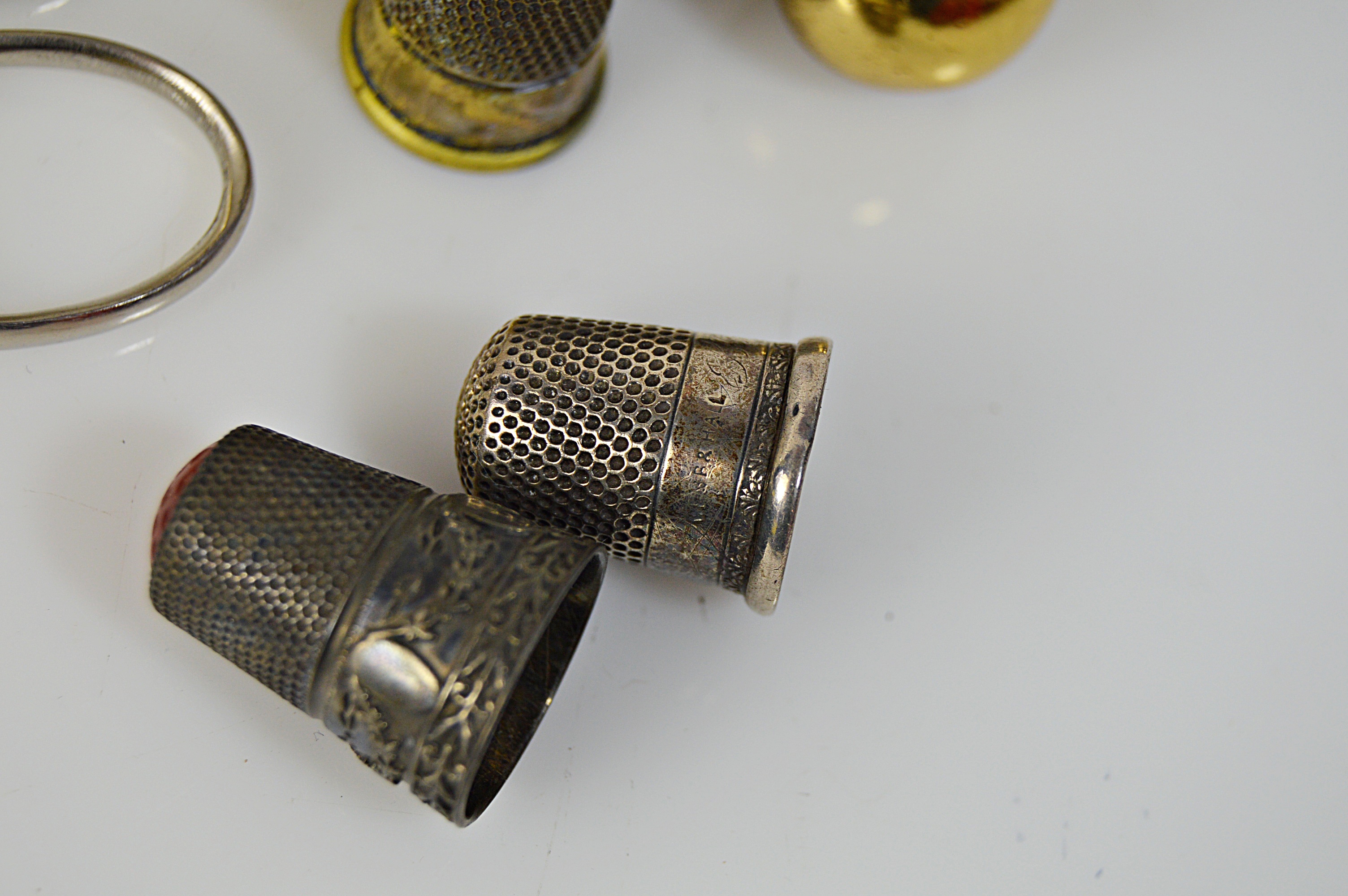 Vintage Sewing Collectibles with Glass Darning Egg, Sterling Thimbles, Scissors