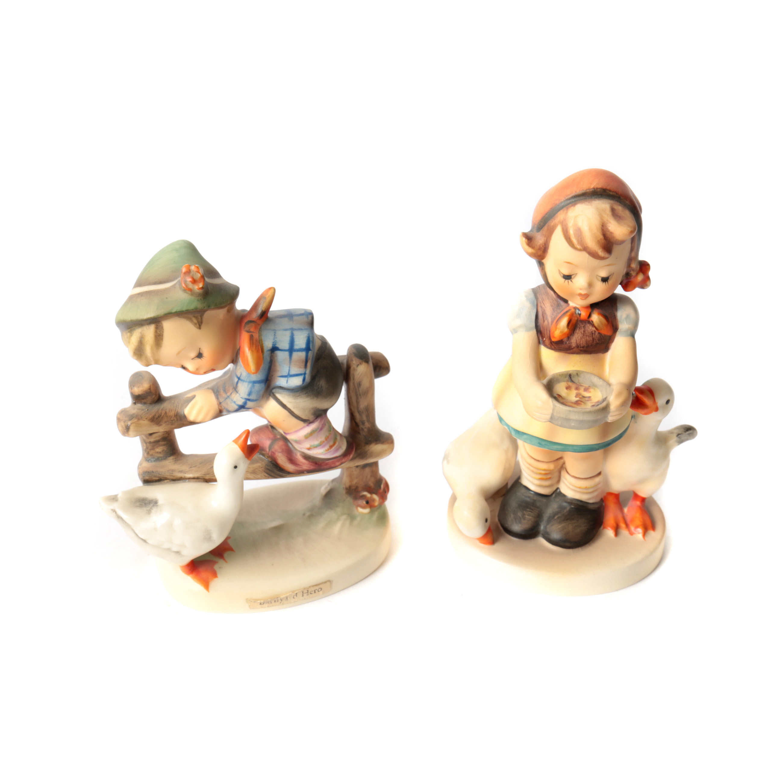 Pair of Porcelain Goebel Hummel Figurines "Be Patient" and "Barnyard Hero"