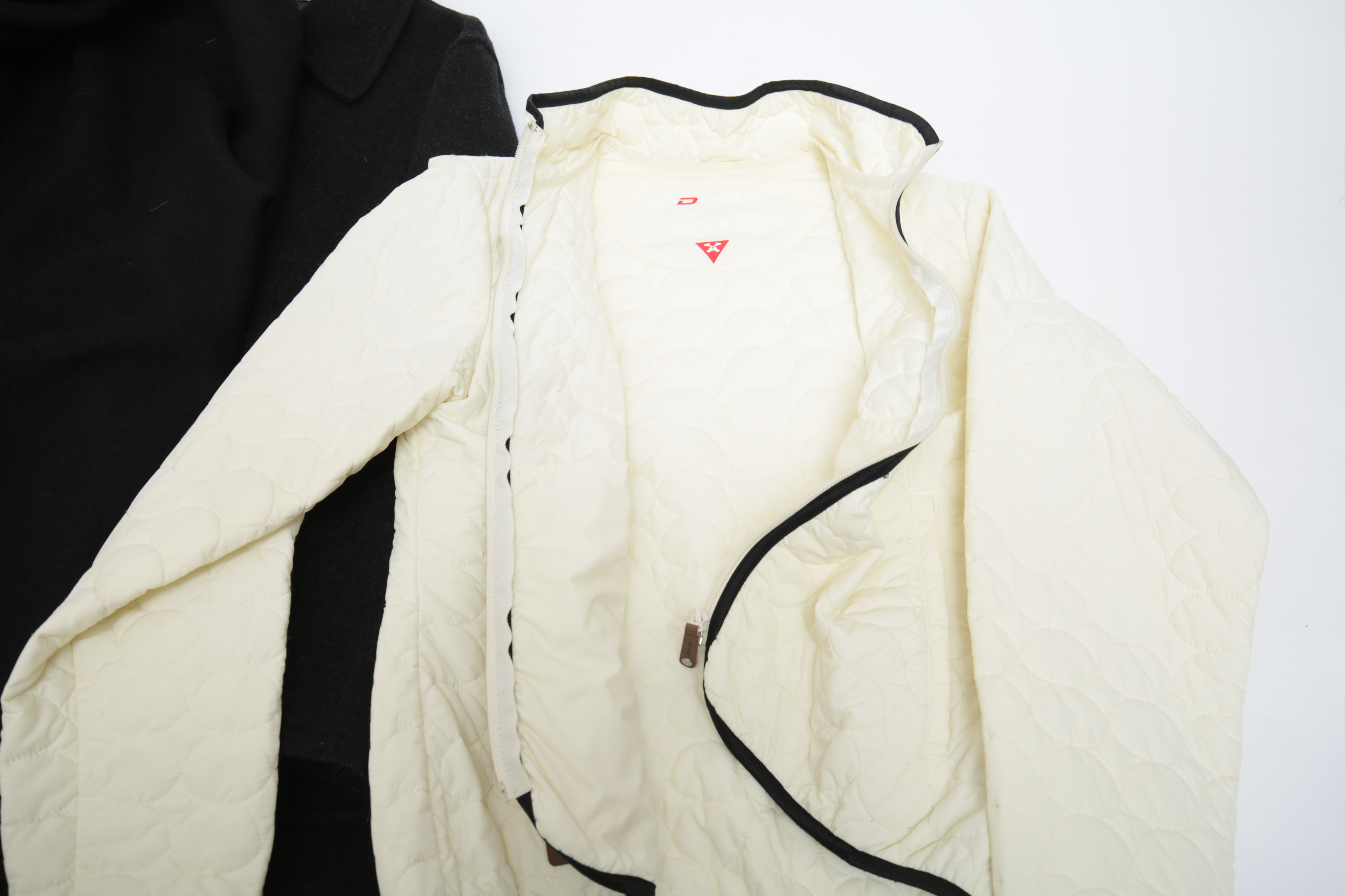 Collection of Black and White Coats Featuring Geiger and Brooks Brothers