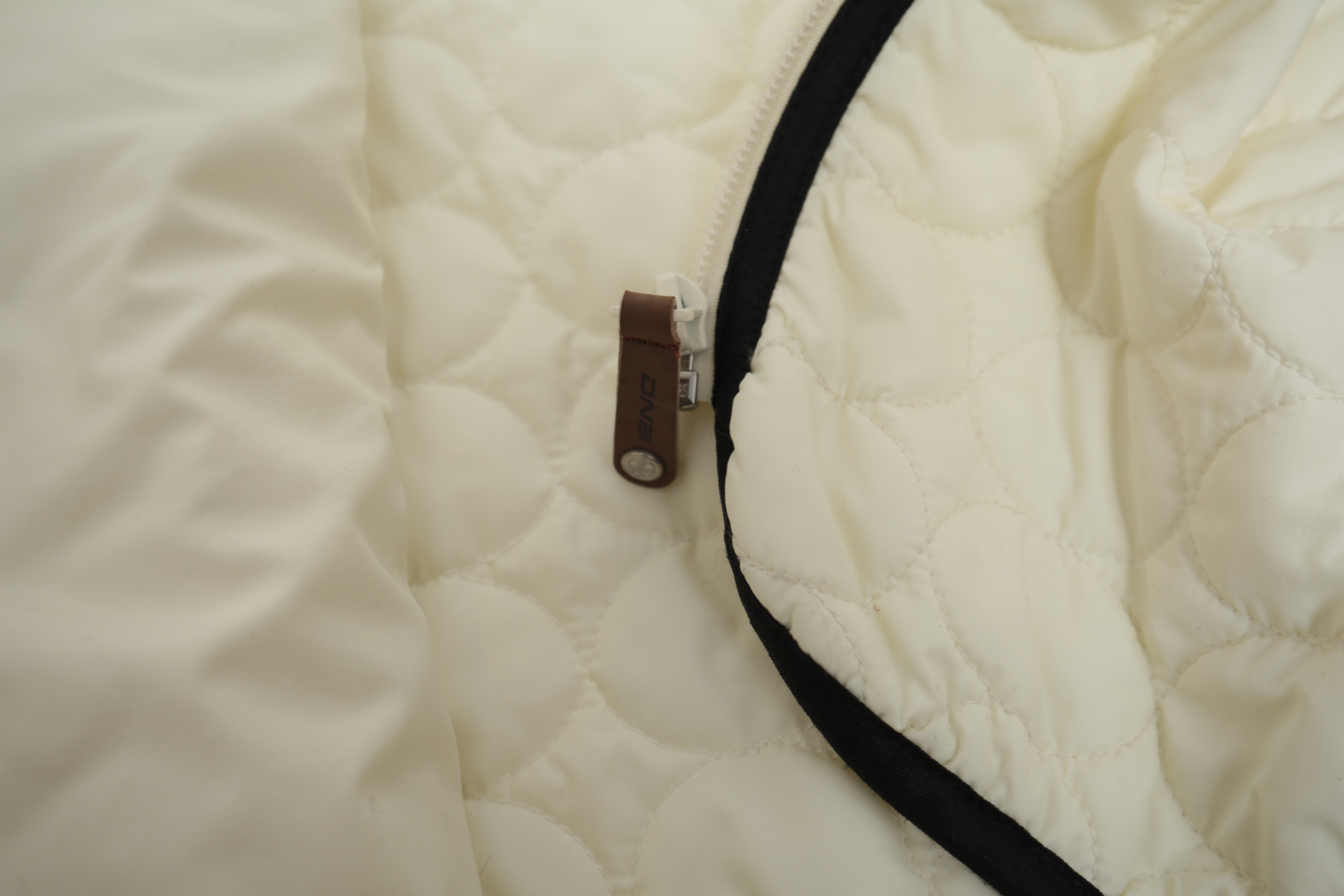 Collection of Black and White Coats Featuring Geiger and Brooks Brothers