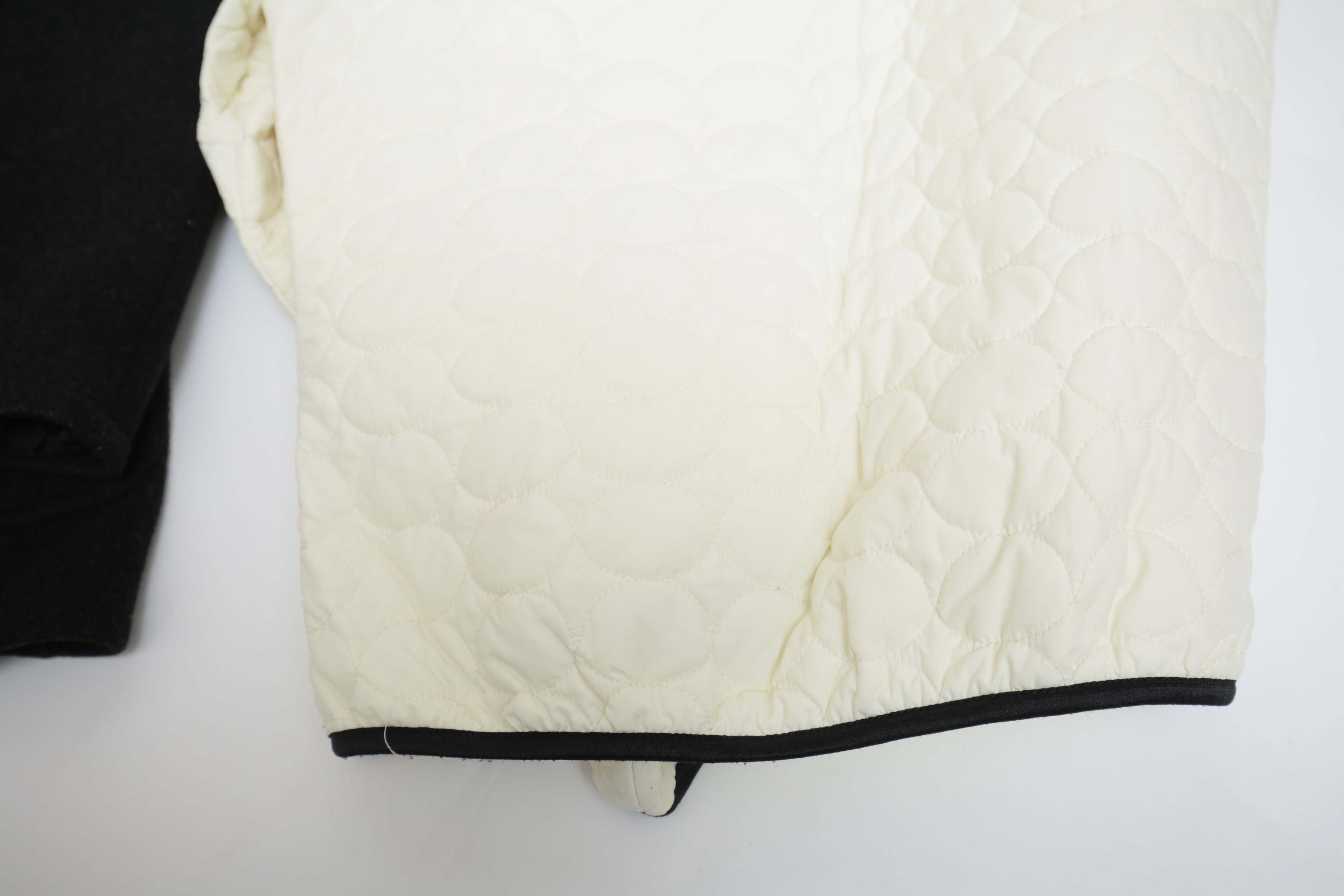 Collection of Black and White Coats Featuring Geiger and Brooks Brothers