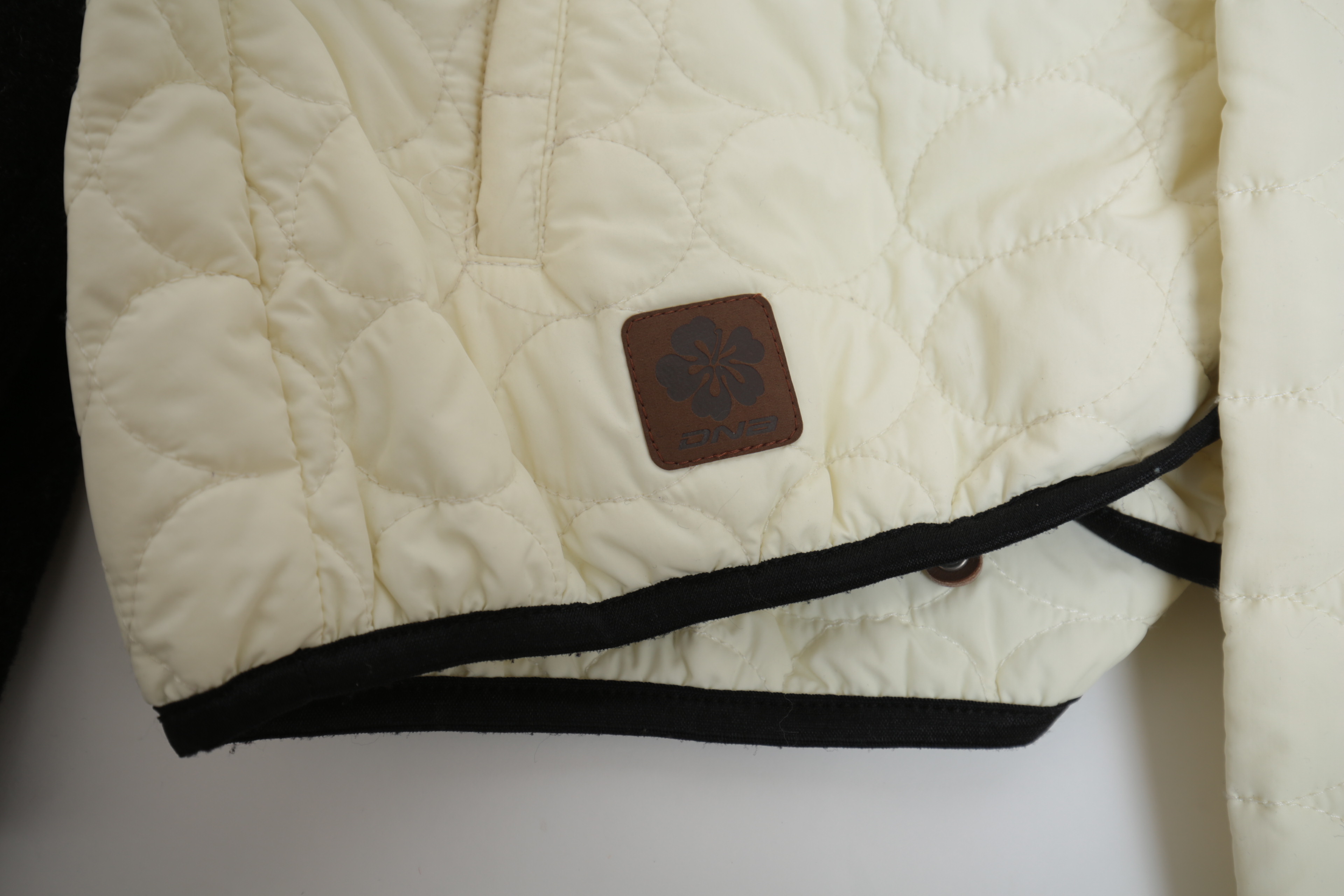 Collection of Black and White Coats Featuring Geiger and Brooks Brothers