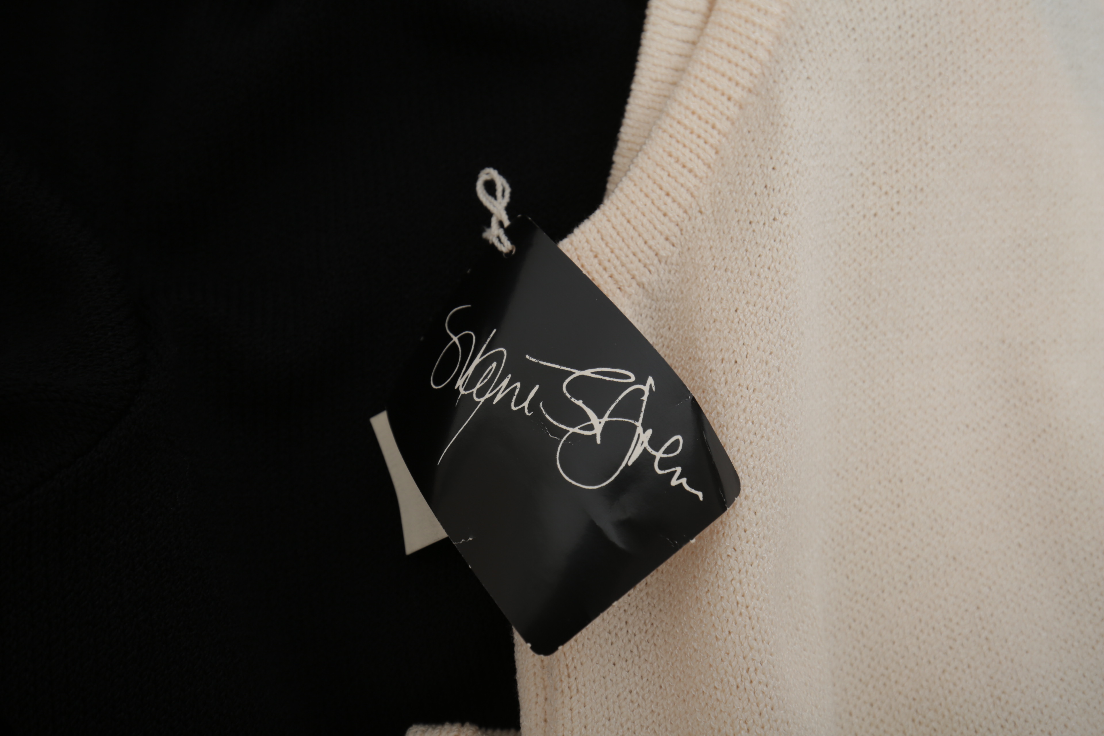 St. John Knitwear Set in Cream with Black Knit Trousers