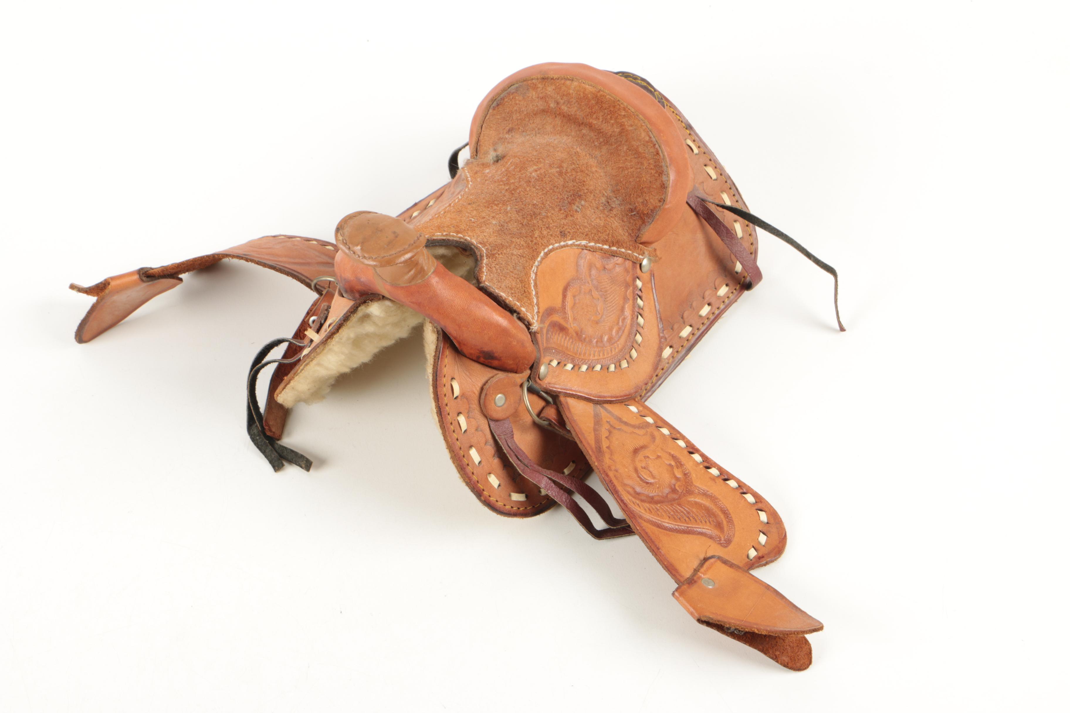 Miniature Tooled Leather Western Saddle, Rowel Spurs and Decorative Powder Horn