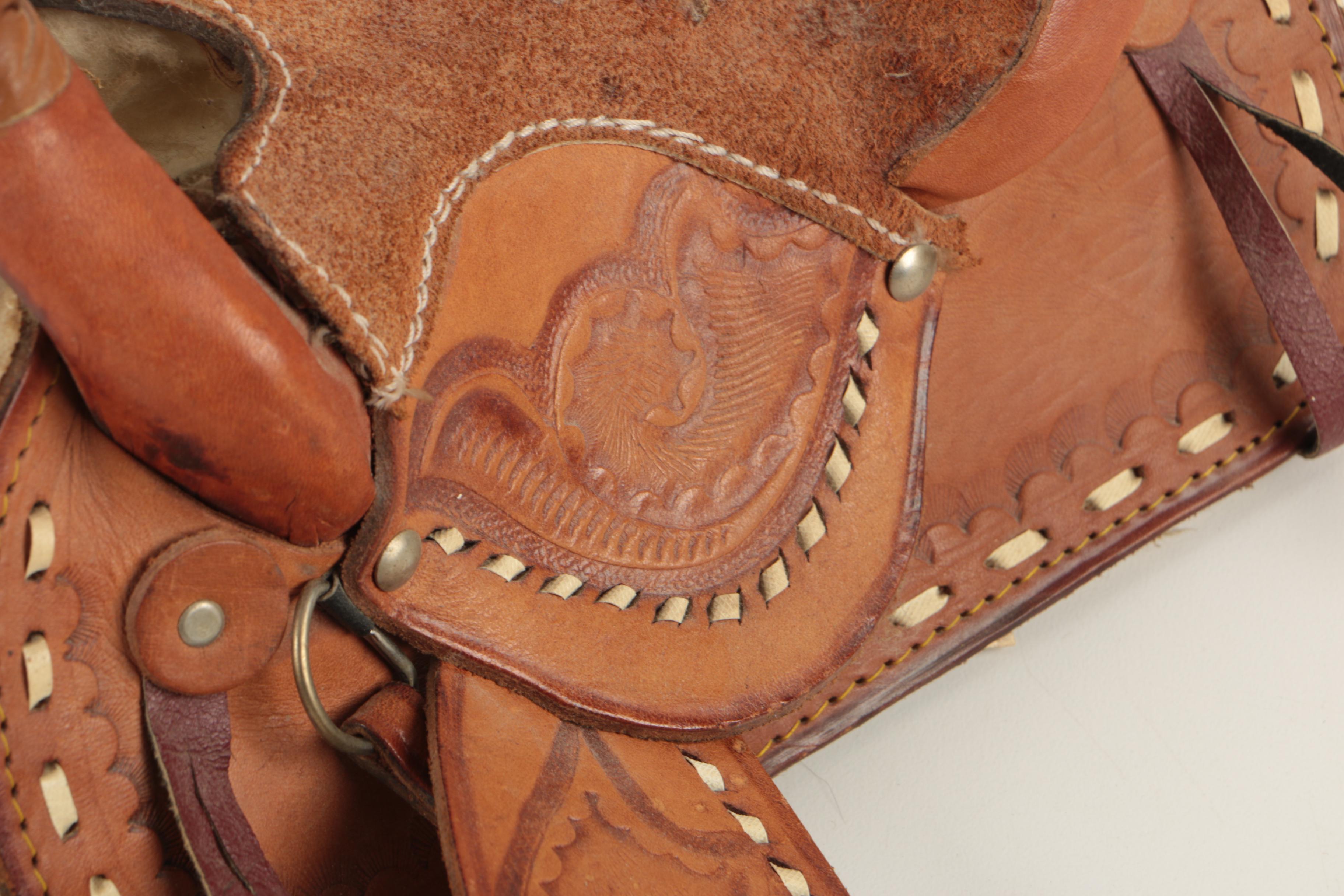 Miniature Tooled Leather Western Saddle, Rowel Spurs and Decorative Powder Horn